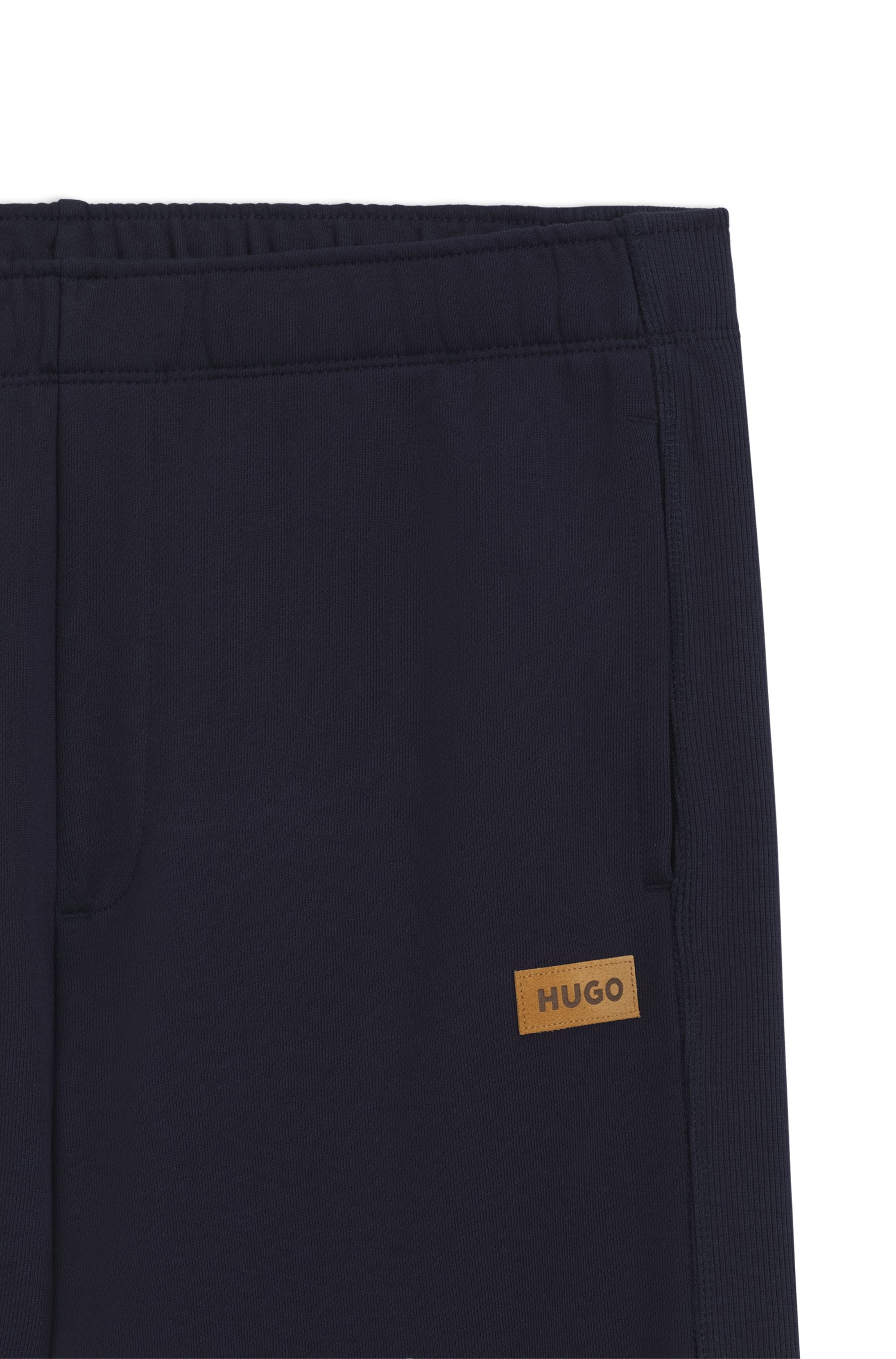 HUGO Pantalon sweat »Nevatro«  Regular Fit, Zierhosenschlitz, elastische Bündchen