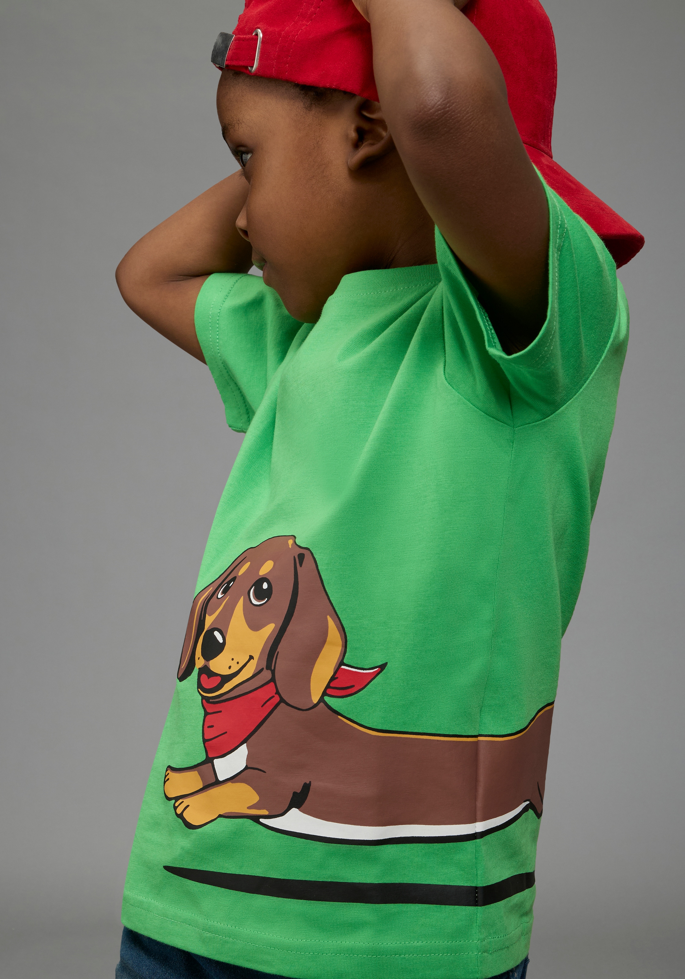 Image of KIDSWORLD T-Shirt "Shirt mit rundum Dackel-Print" Basic Passform, Kurzarm, bedruckte Optik, aus Baumwolle