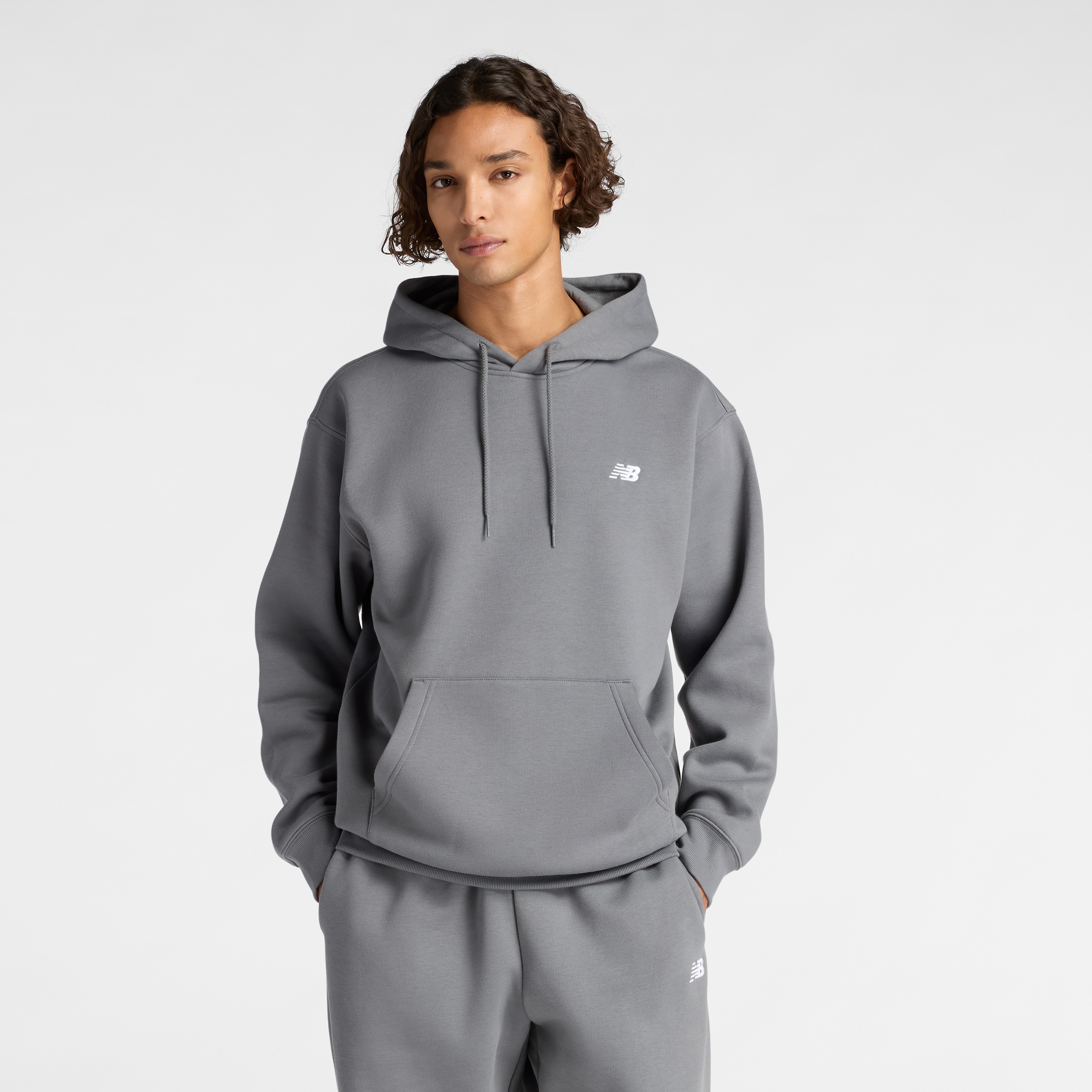 New Balance Kapuzensweatshirt "Sport Essentials Fleece Hoodie", entspannte Passform, mit Logo-Branding