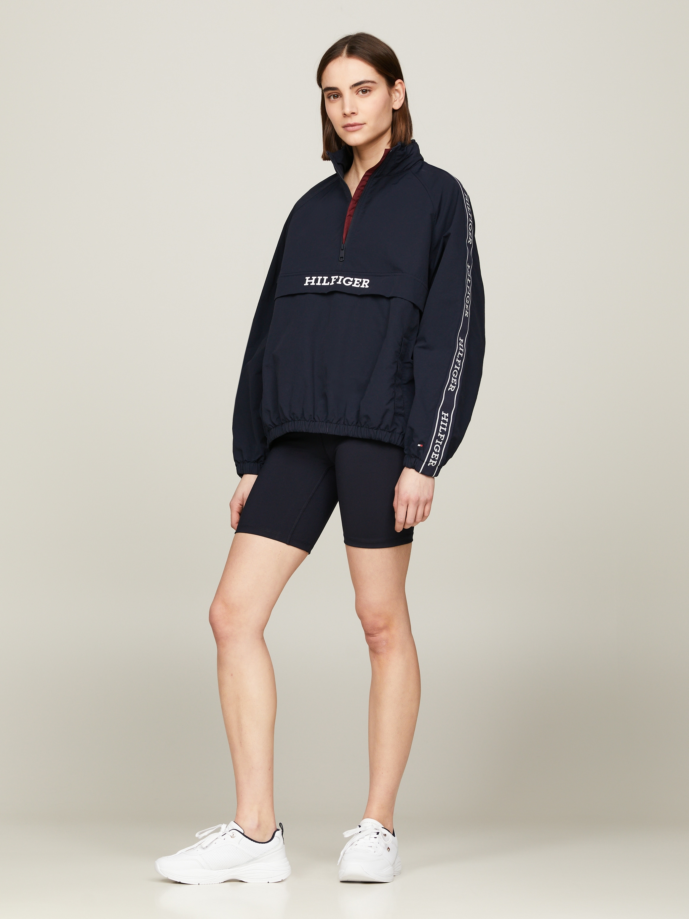 Tommy Hilfiger Outdoorjacke »MONOTYPE TAPE RLX 1/2 ZIP JACKET«, mit Logo-Tape