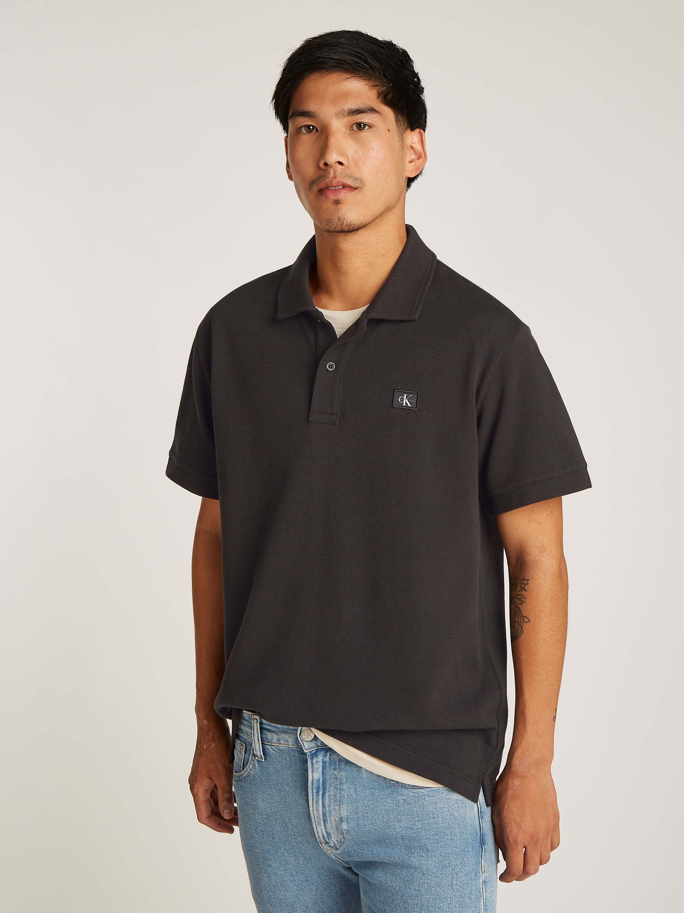 Calvin Klein Jeans Poloshirt »WOVEN LABEL POLO«, Logodruck