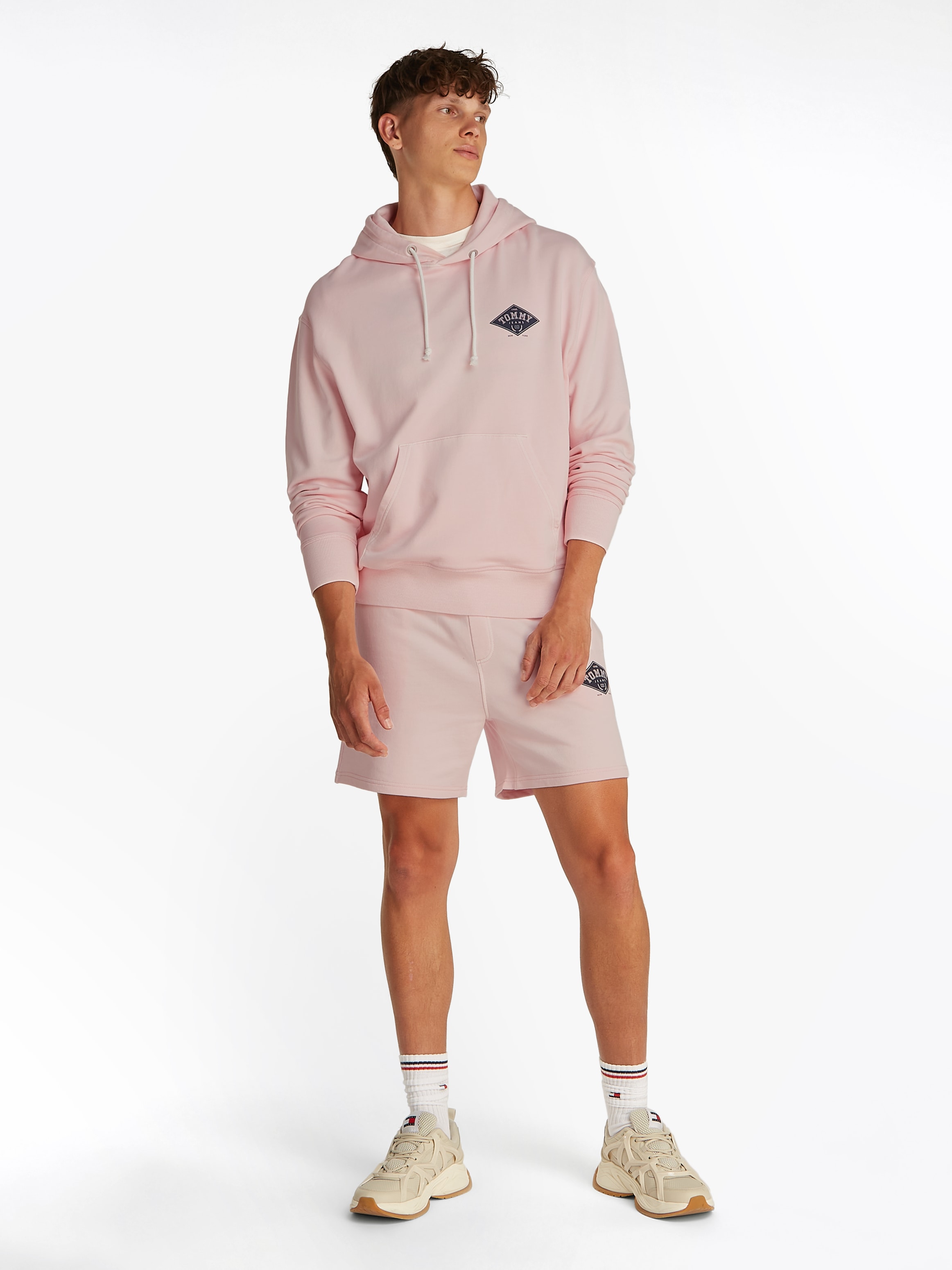 Tommy Jeans Kapuzensweatshirt »TJM RLX VARSITY GRAPHICS HOODIE«, mit grossem Rückenprint