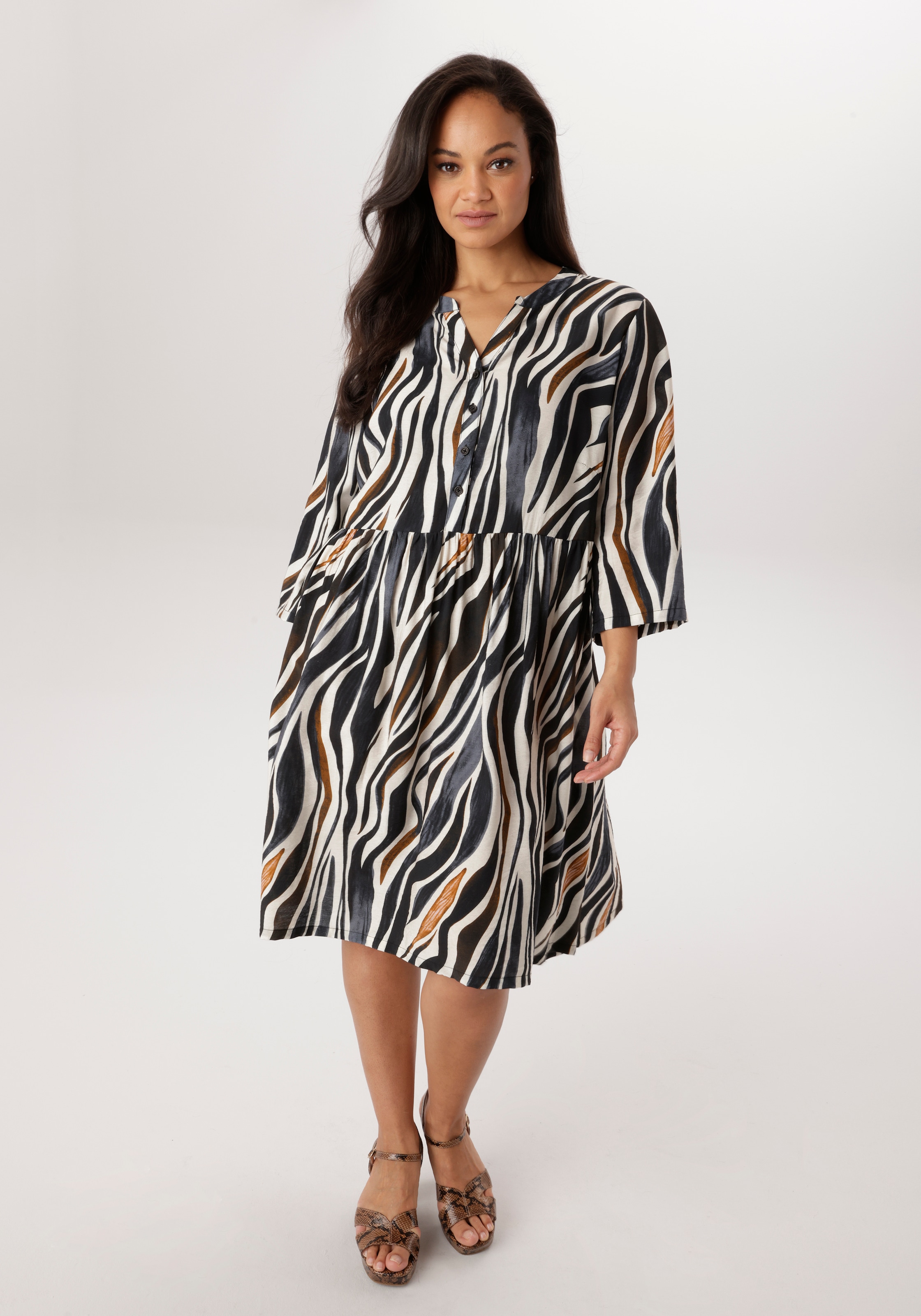 Image of Aniston PLUS Tunikakleid im extravaganten Zebra-Print