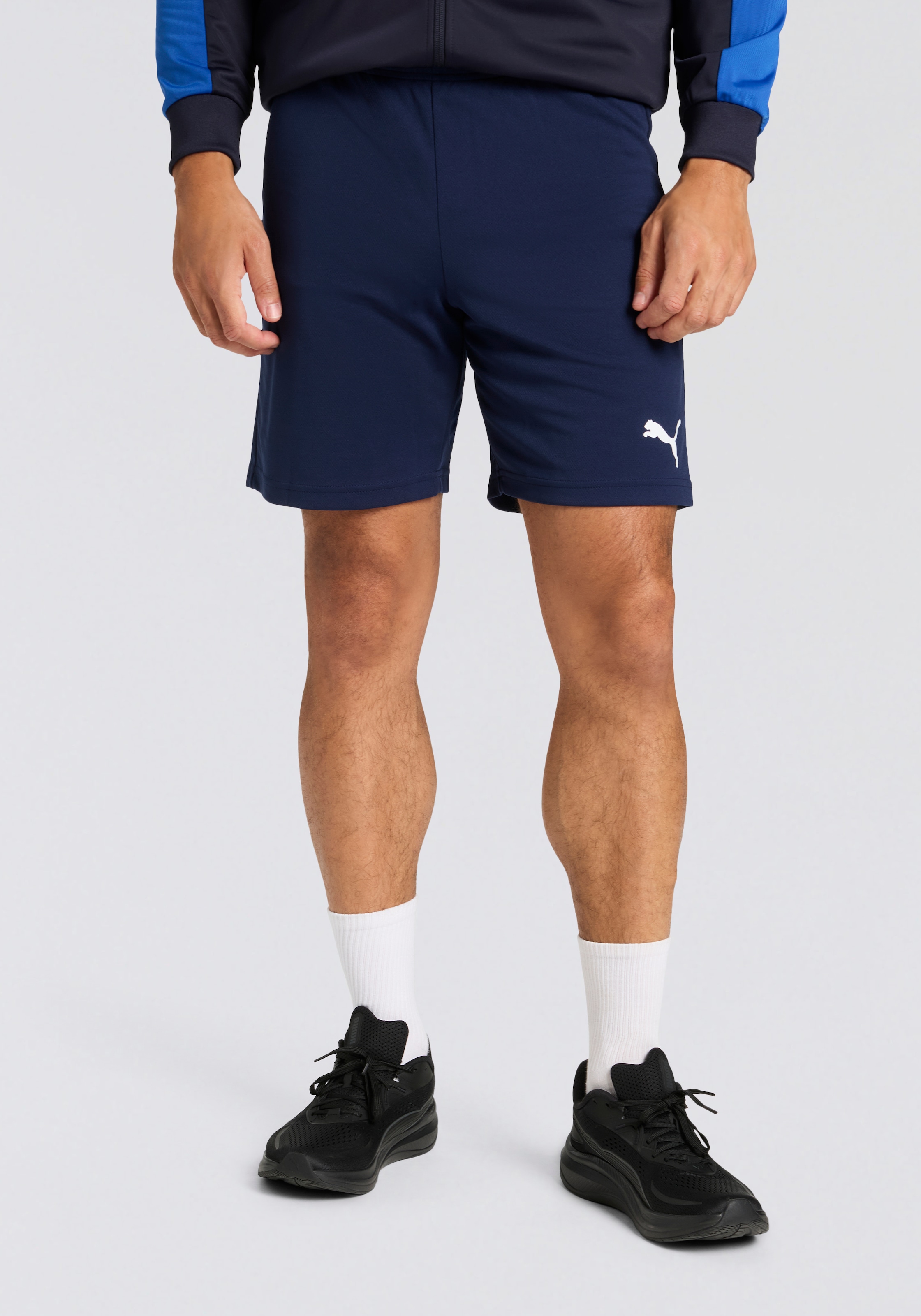 Image of PUMA Trainingsshorts "TEAMRISE SHORT" atmungsaktives Material, mit DryCELL Technologie, elastischer Bund