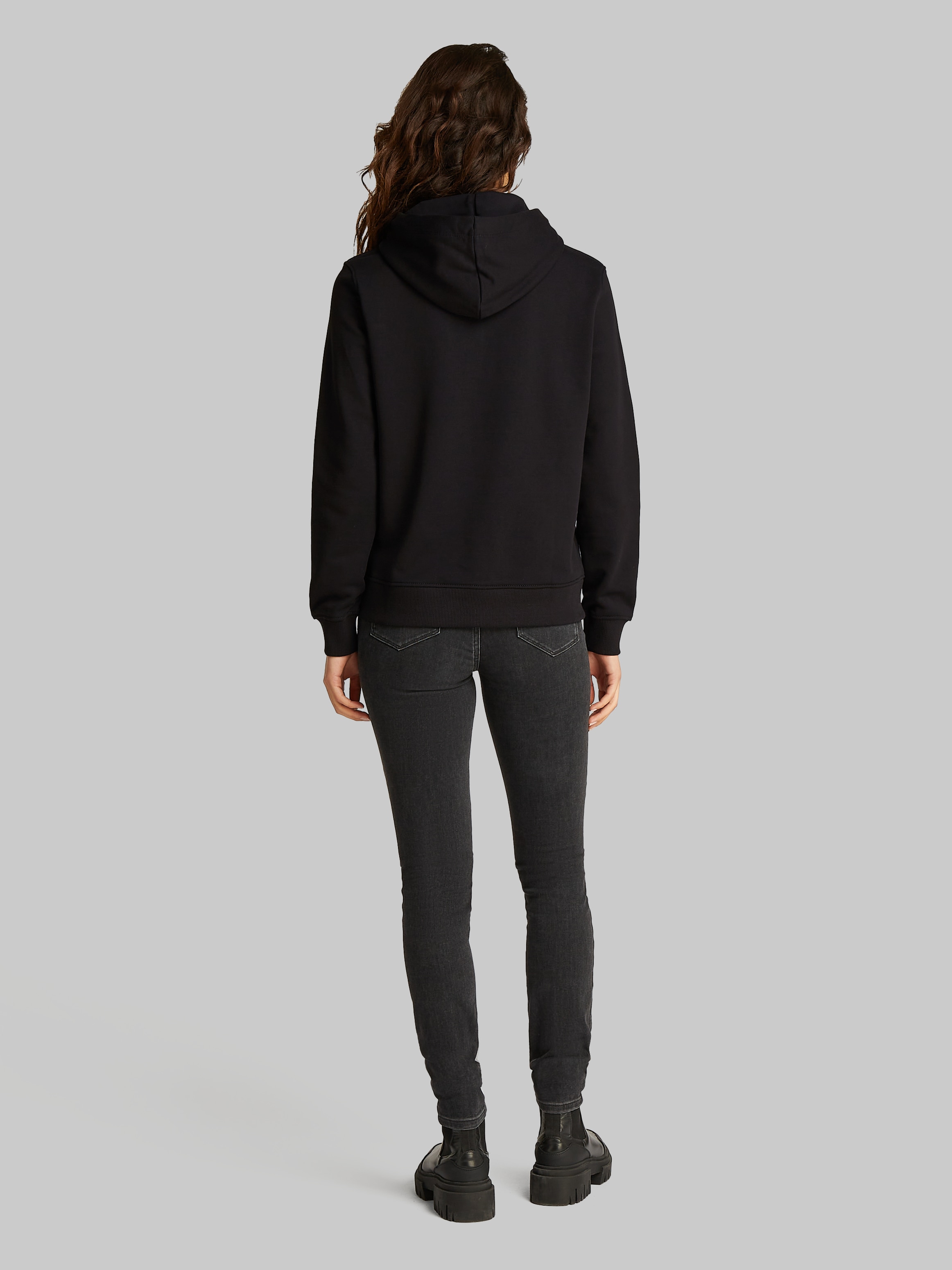 Calvin Klein Jeans Kapuzensweatshirt »WOVEN LABEL REGULAR HOODIE« mit kleinem Logo-Patch