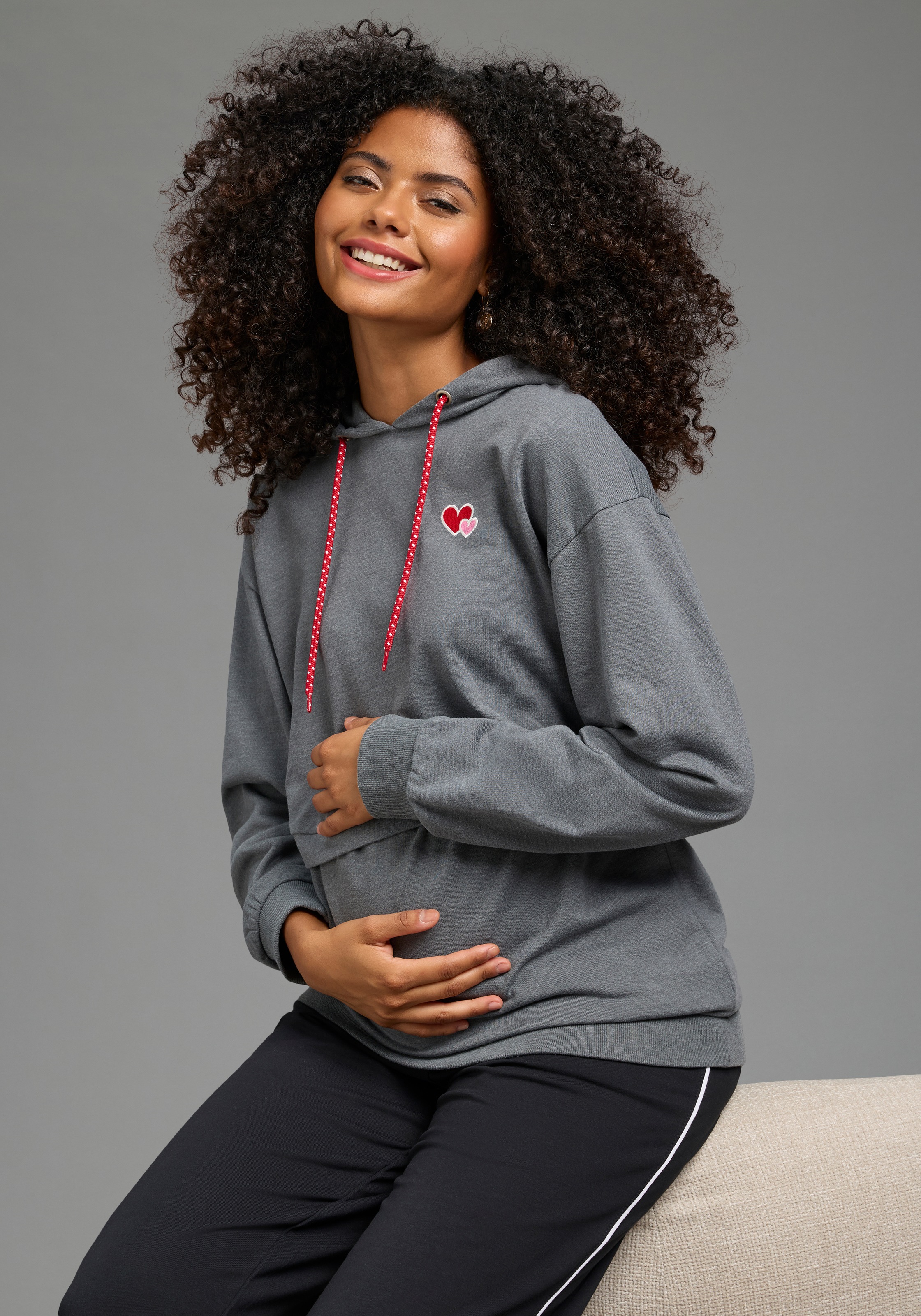 Image of Neun Monate Umstandssweatshirt "Kapuzensweatshirt für Schwangerschaft und Stillzeit", mit Kapuze, Langarm, aus Baumwolle und Polyester
