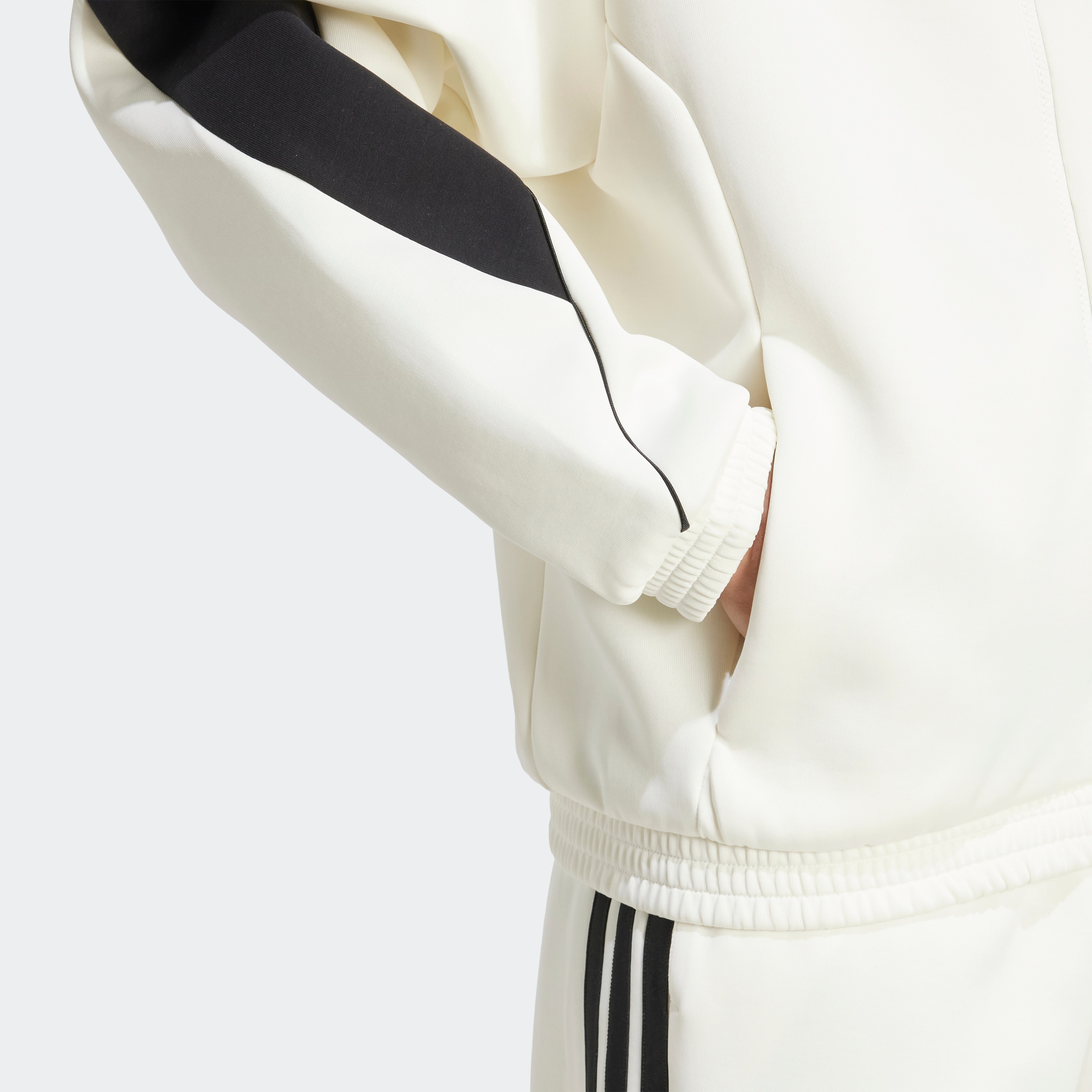 adidas Sportswear Veste d'entraînement »STADIUM« avec col roulé, coupe décontractée, en polyester et coton
