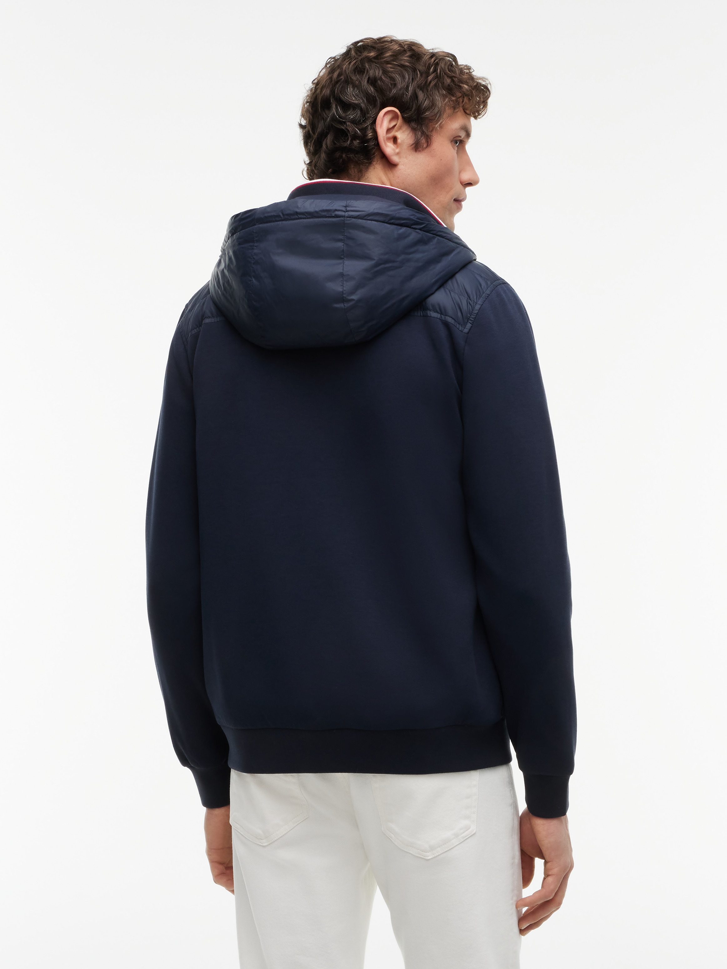 Tommy Hilfiger Veste matelassée »MIX MEDIA RWB REGULAR HOODED« avec capuche dos et manches en tissu sweat, coupe normale