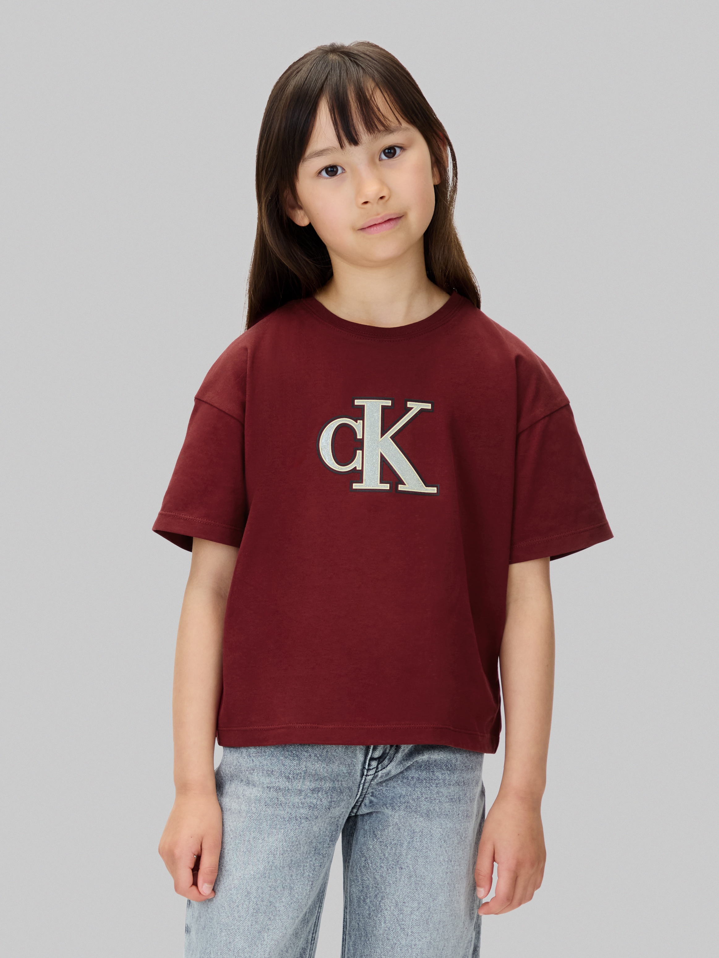Image of Calvin Klein Jeans T-Shirt "FESTIVE GRAPHIC SS T-SHIRT" für Kinder bis 16 Jahre, Glitzer-Druck