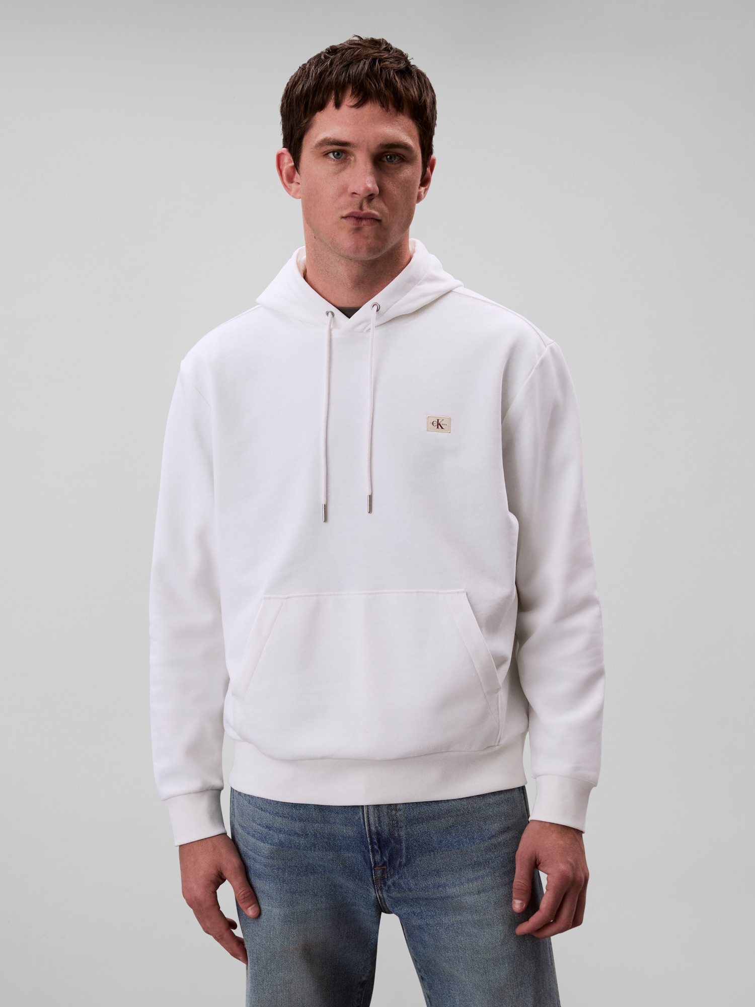 Calvin Klein Jeans Sweat à capuche »400GSM TERRY BADGE HOODIE«, Mit Rundhalsausschnitt
