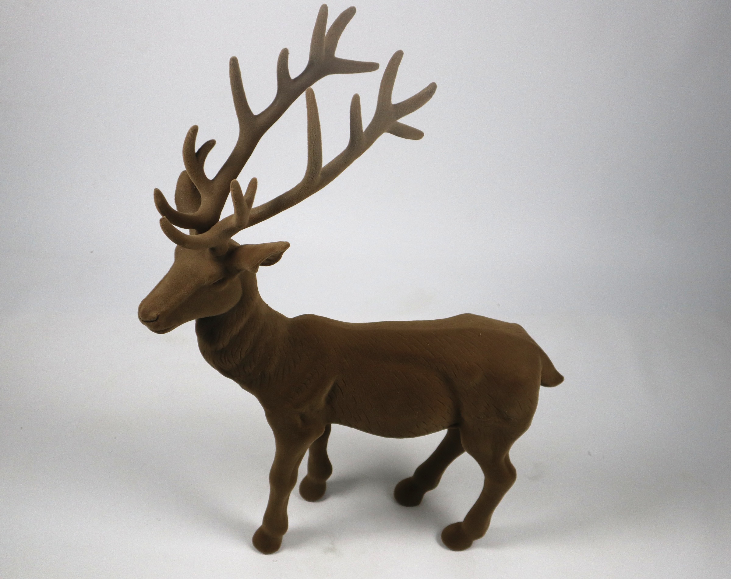 AM Design Weihnachtsfigur »Rentier stehend mit samtweichem Flock« aus Kunststoff, Höhe 76 cm, in verschiedenen Farben