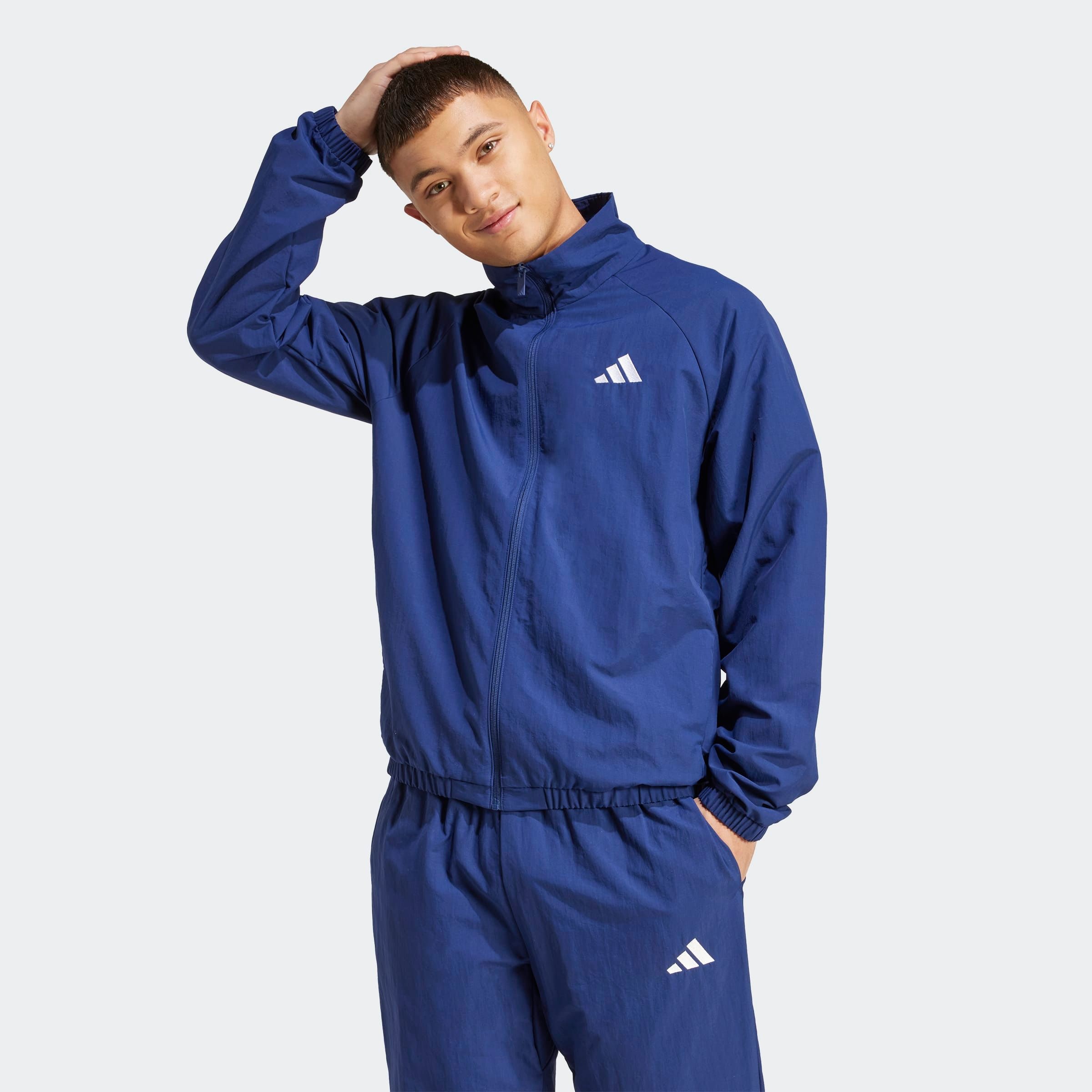 adidas Sportswear Coupe-vent »ESSENTIAL MIT KLEINEM LOGO«
