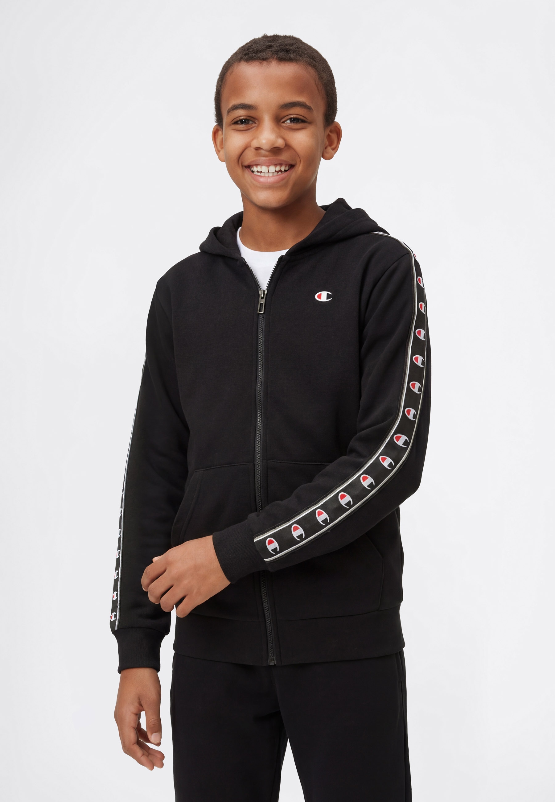 Champion Jogginganzug »Sport inspired Hooded Full Zip sweatsuit« 2 tlg. für Kinder, mit Kapuze, mit durchgehendem Reissverschluss