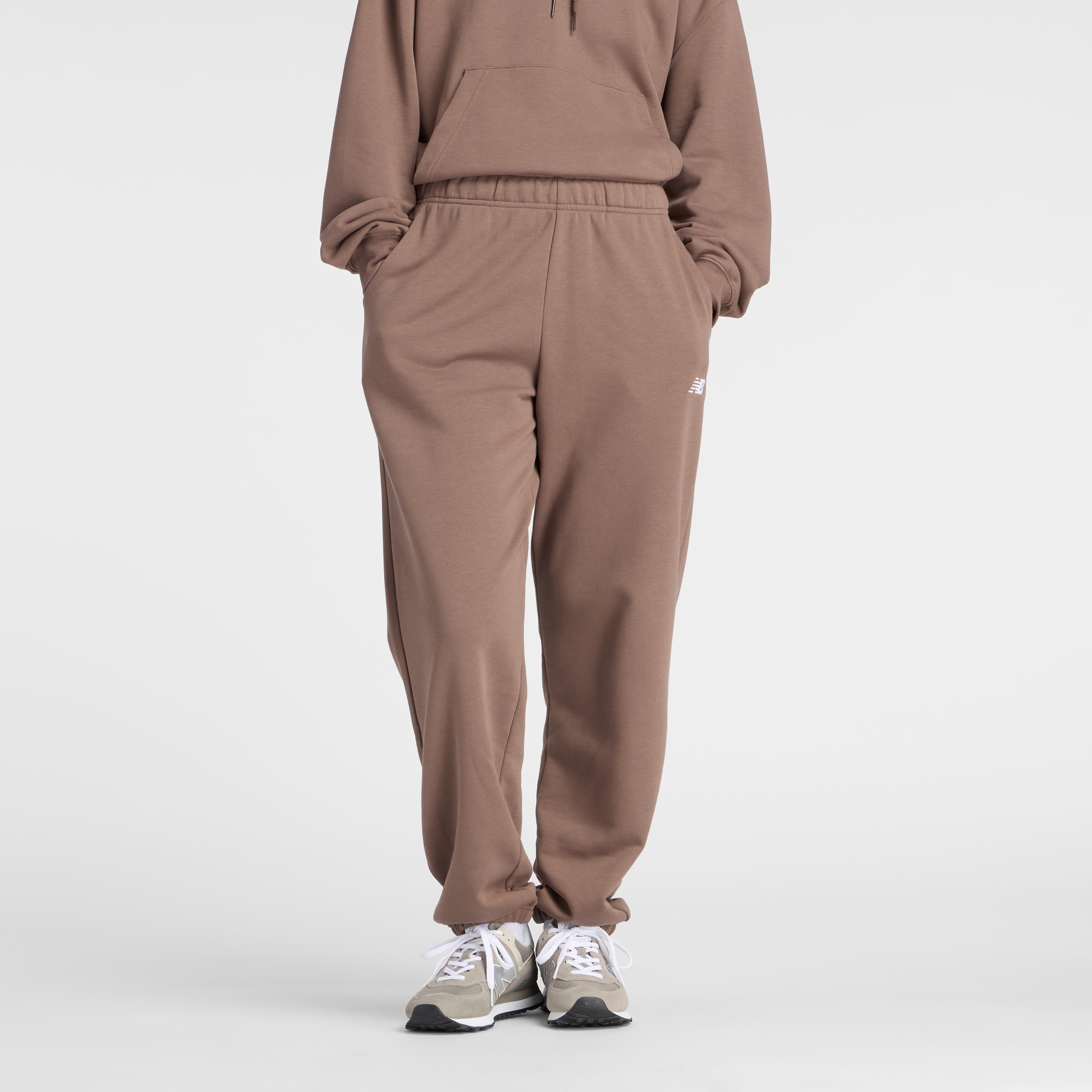 New Balance Pantalon de jogging »SPORT ESSENTIALS FRENCH TERRY JOGGER«  lockere Passform