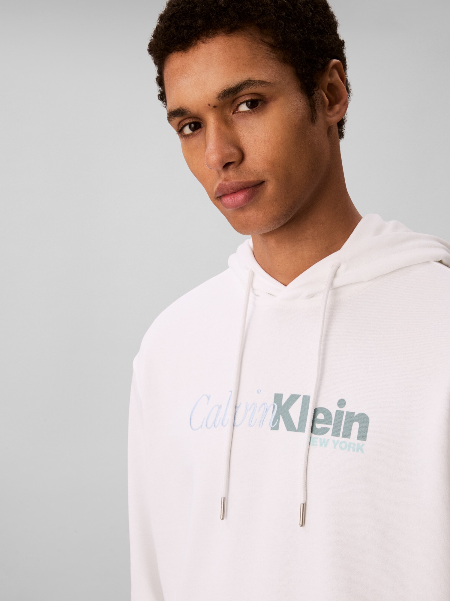 Calvin Klein Kapuzensweatshirt »LS EU 350TERRY CURSIVE GRAPHIC H« regular fit, Logo-Schriftzug