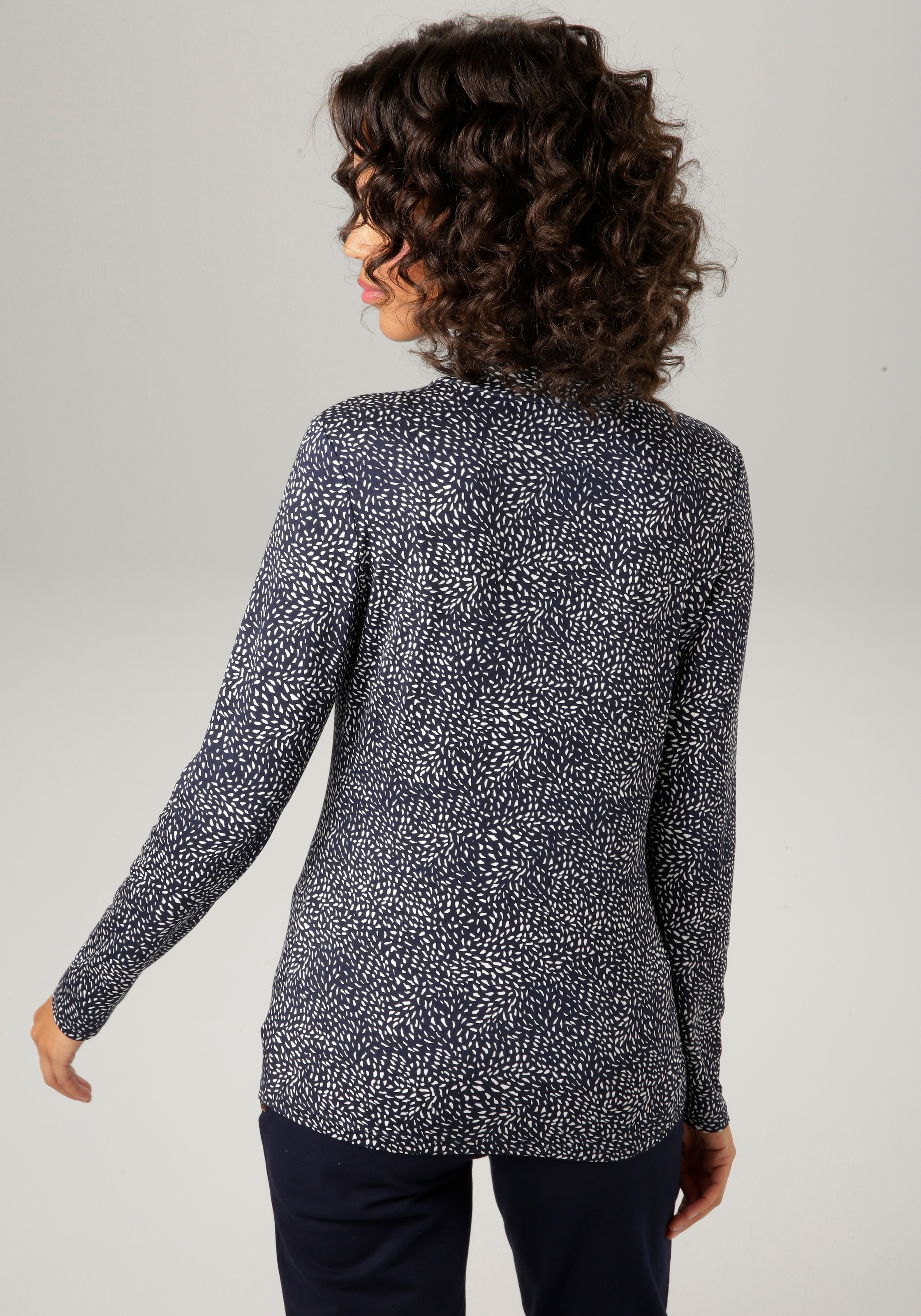 Aniston CASUAL Rollkragenshirt, mit Animal-Print oder graphischem Druck