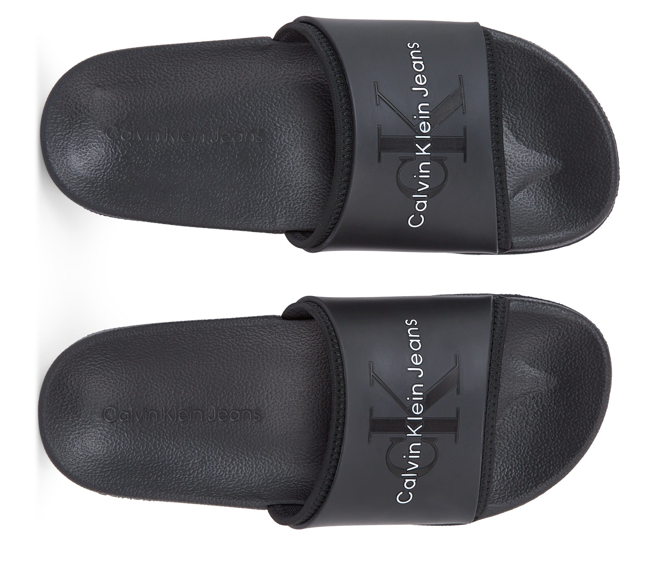 Calvin Klein Jeans Badepantolette »SLIDE MONOGRAM TPU ML WN«, Sommerschuh, Schlappen, Poolslides mit Logoschriftzug