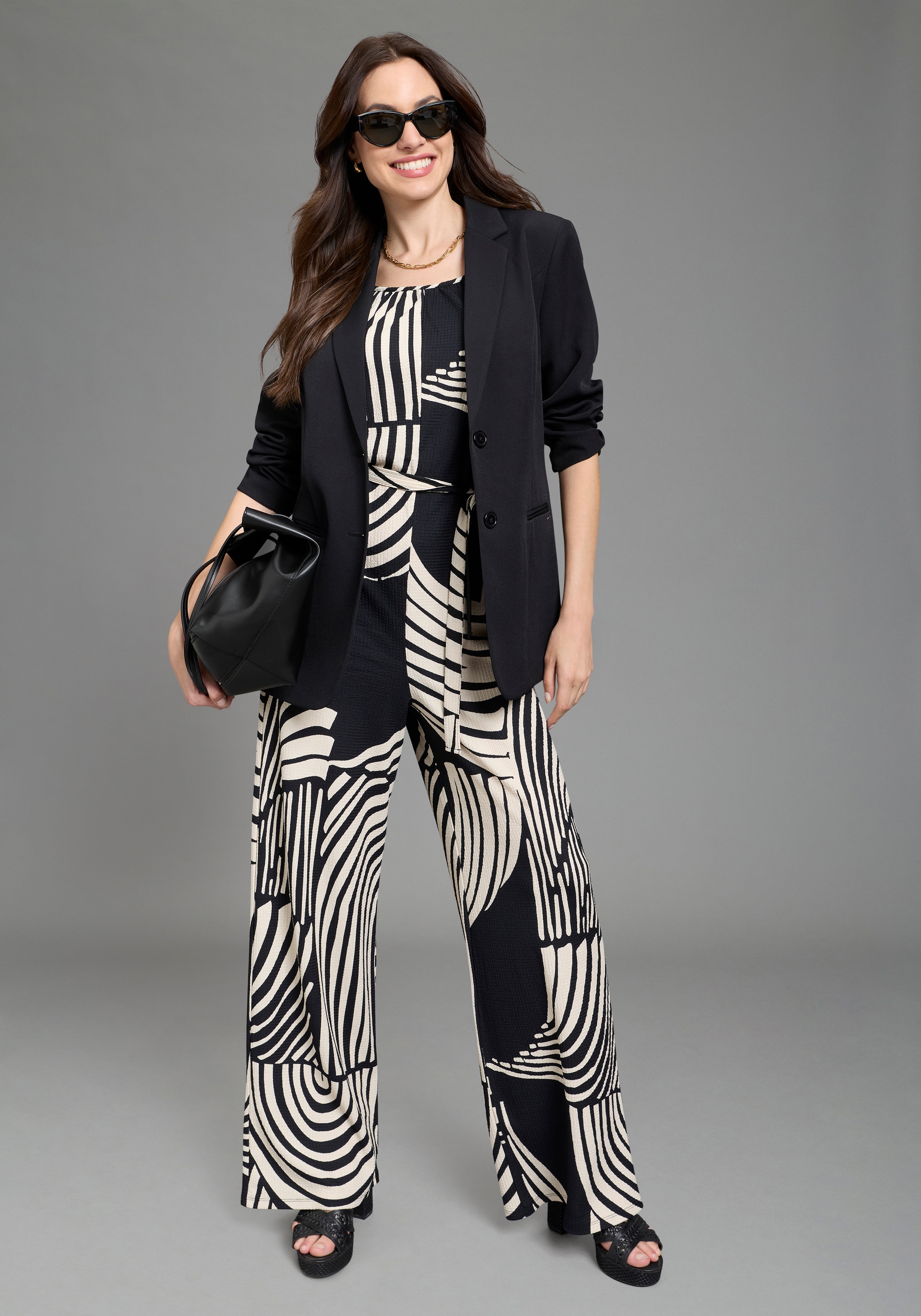 Laura Scott Jumpsuit moderner Look, ohne Ärmel, aus Polyester und Elasthan, in Grösse 34