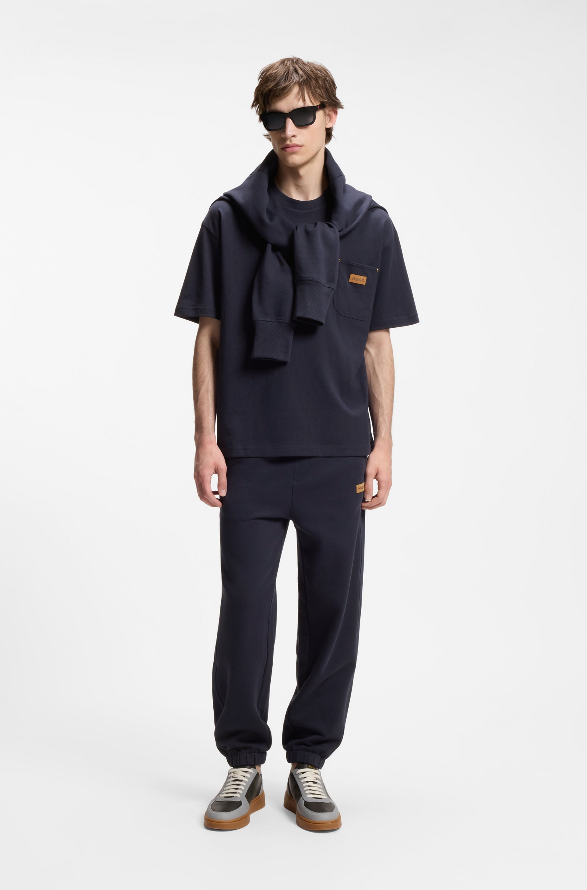HUGO Pantalon sweat »Nevatro«  Regular Fit, Zierhosenschlitz, elastische Bündchen