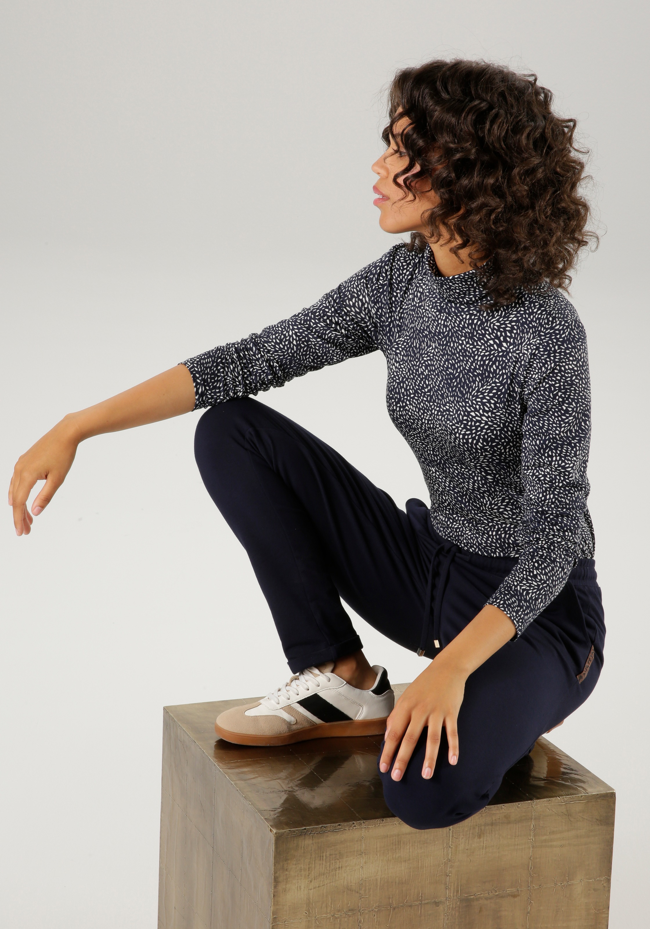 Aniston CASUAL Rollkragenshirt, mit Animal-Print oder graphischem Druck