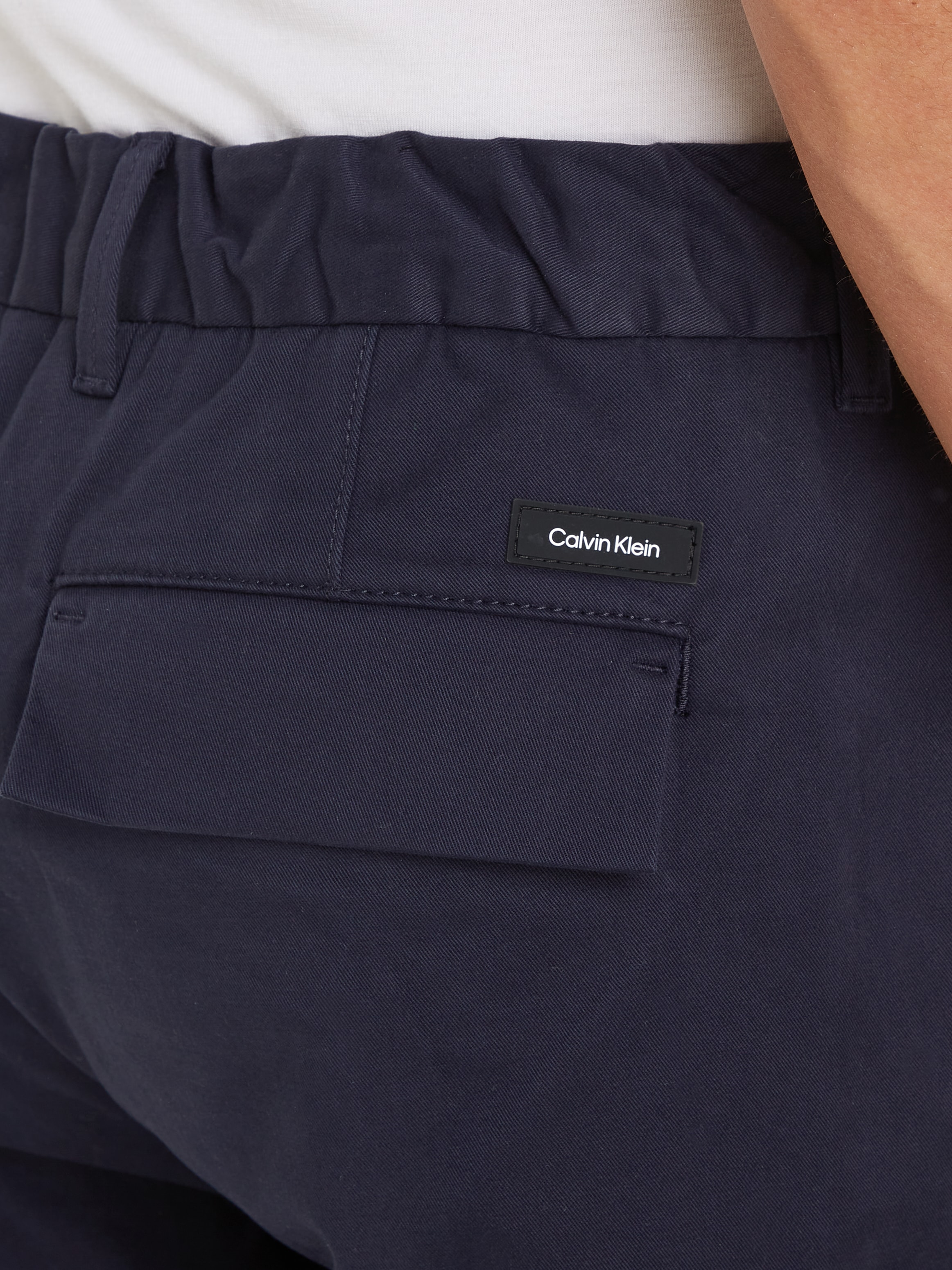 Calvin Klein Bügelfaltenhose »MODERN TWILL TAPERED PLEAT PANTS«, mit Logoprägung
