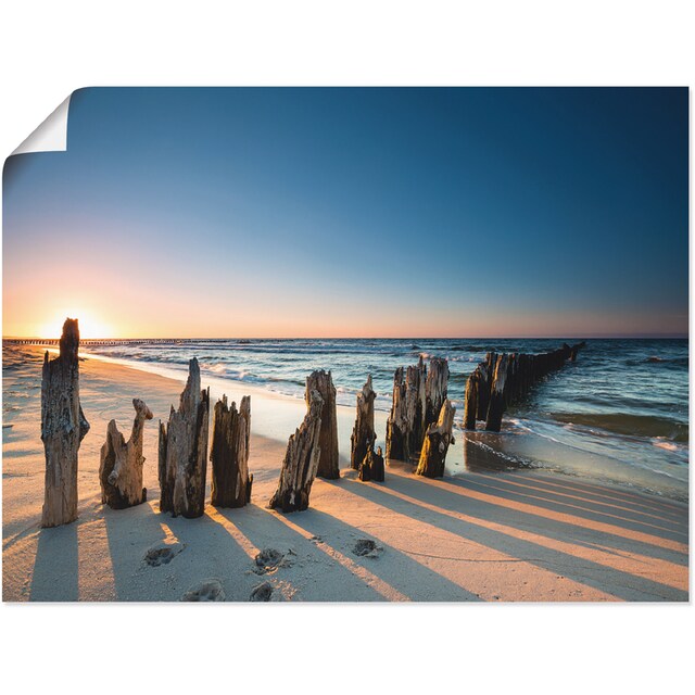 Artland Wandbild »Sonnenuntergang Strand Wellenbrecher«, Meer Bilder, (1 St.),  als Alubild, Leinwandbild, Wandaufkleber oder Poster in versch. Grössen  jetzt kaufen