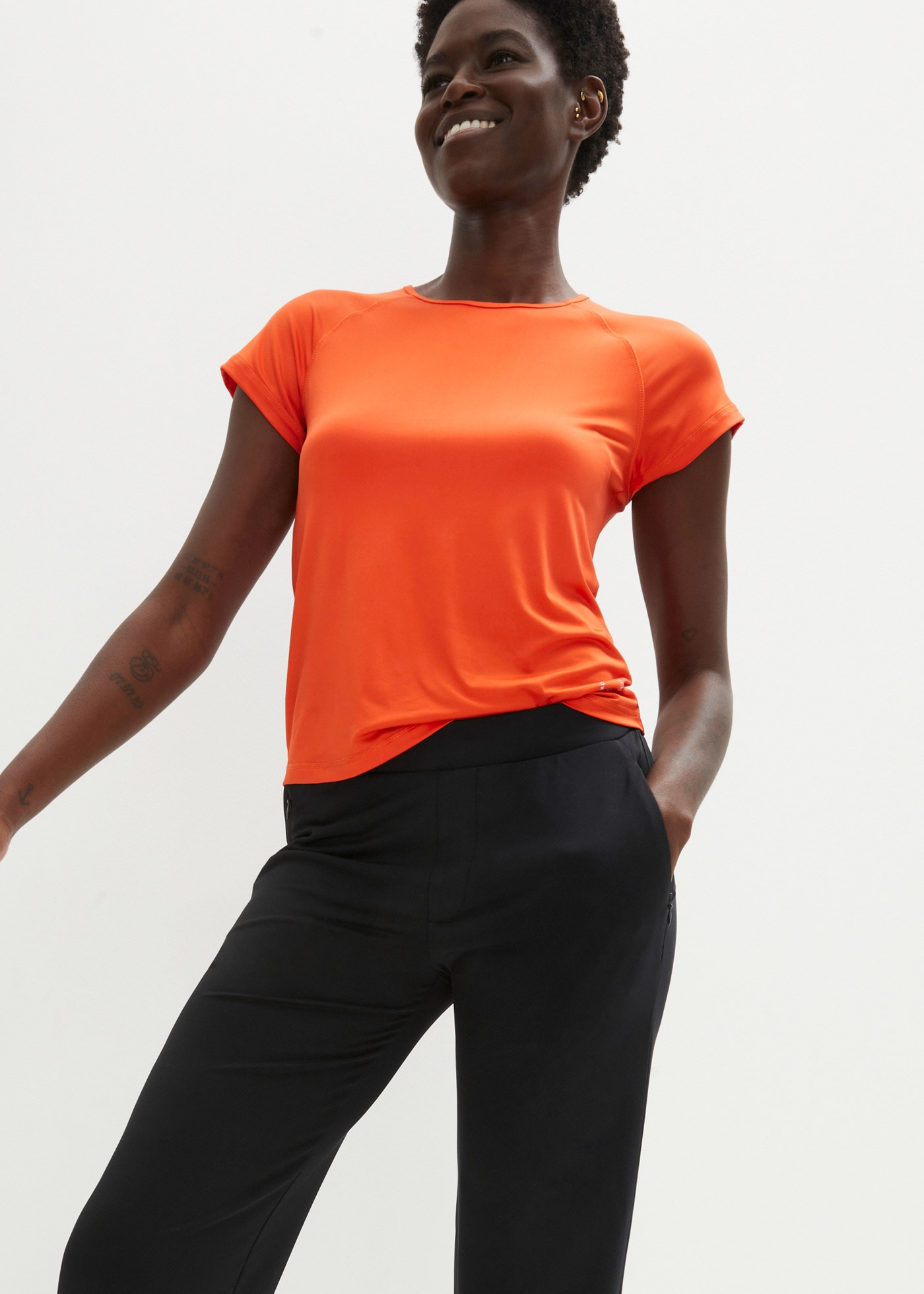 bonprix Jogginghose  aus schnelltrocknendem Stretchmaterial, mit verschliessbaren Taschen