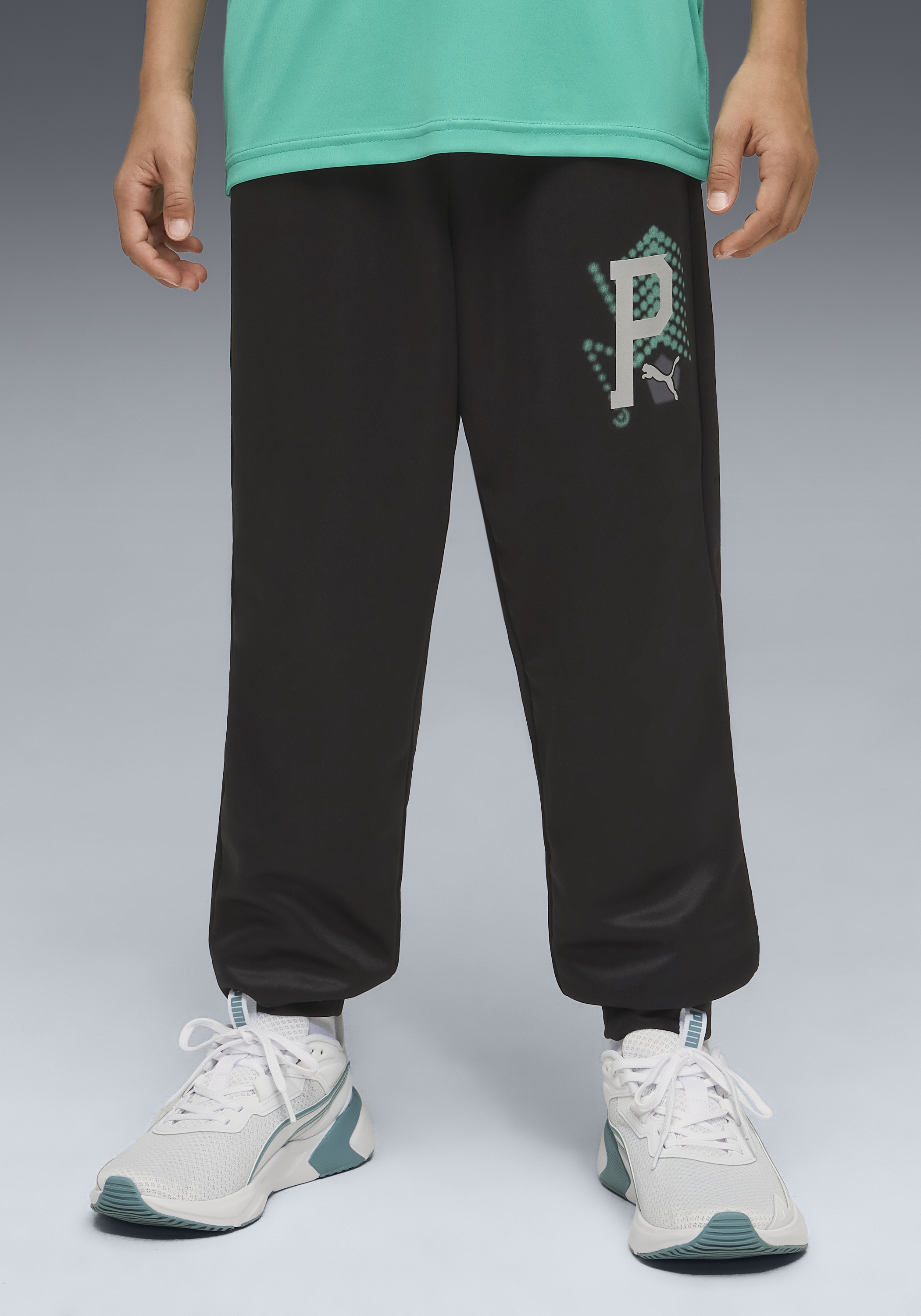 Image of PUMA Trainingshose "ACTIVE SPORTS POLY PANTS B" mit Eingrifftaschen, Regular Fit, mit Print-Applikationen