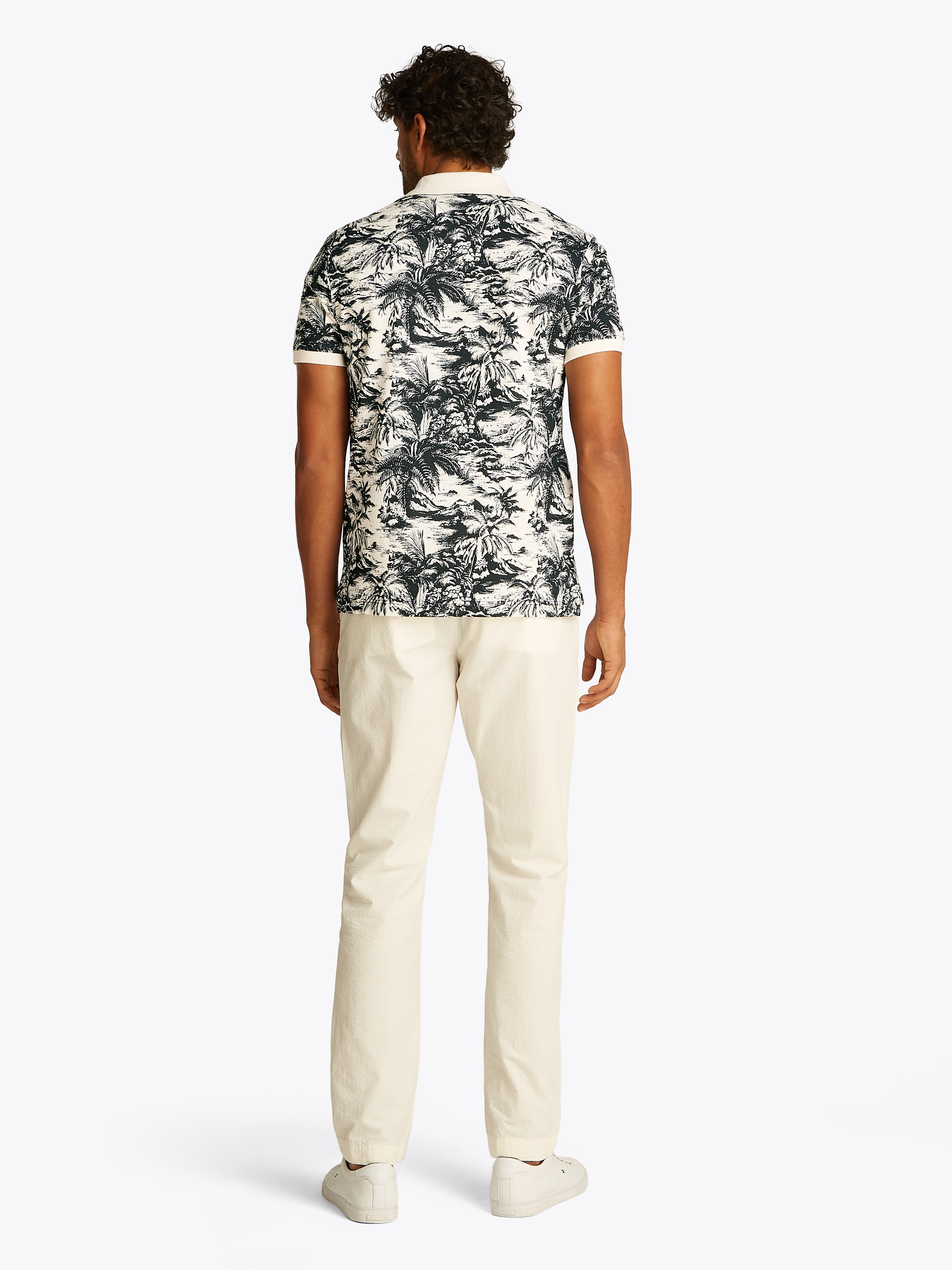 Tommy Hilfiger Poloshirt »ALL OVER PRINT LINEN REG POLO«, mit Palmenprint