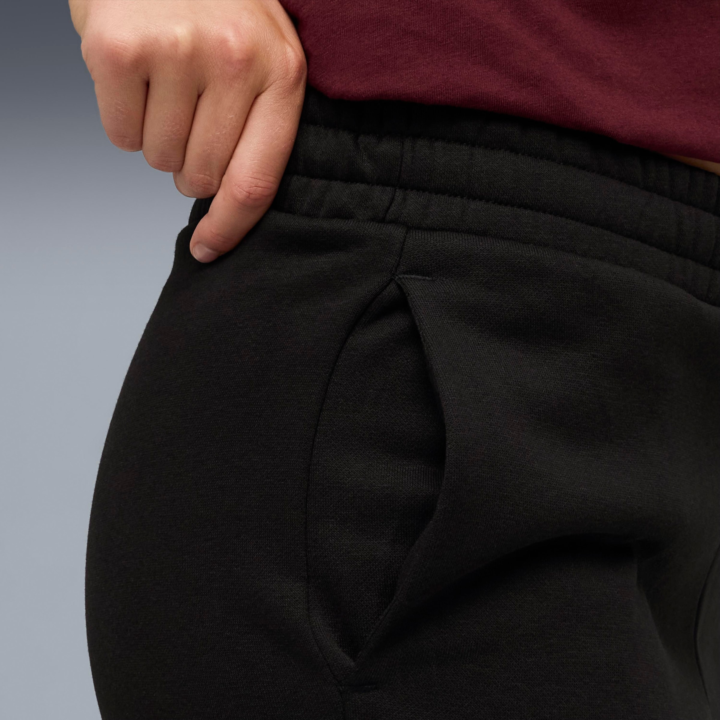 PUMA Pantalon de survêtement »ESS METALLIC SWEATPANTS FL«  style sportif, pour activités variées, avec poches latérales