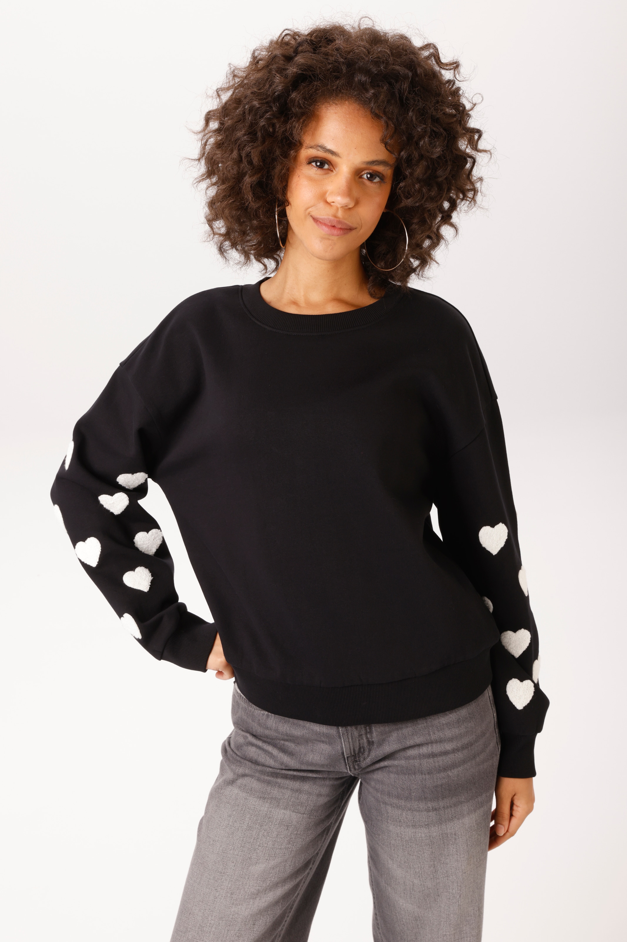 Image of Aniston CASUAL Sweatshirt, mit Frottee-Herzen in den langen Ärmeln - NEUE KOLLEKTION