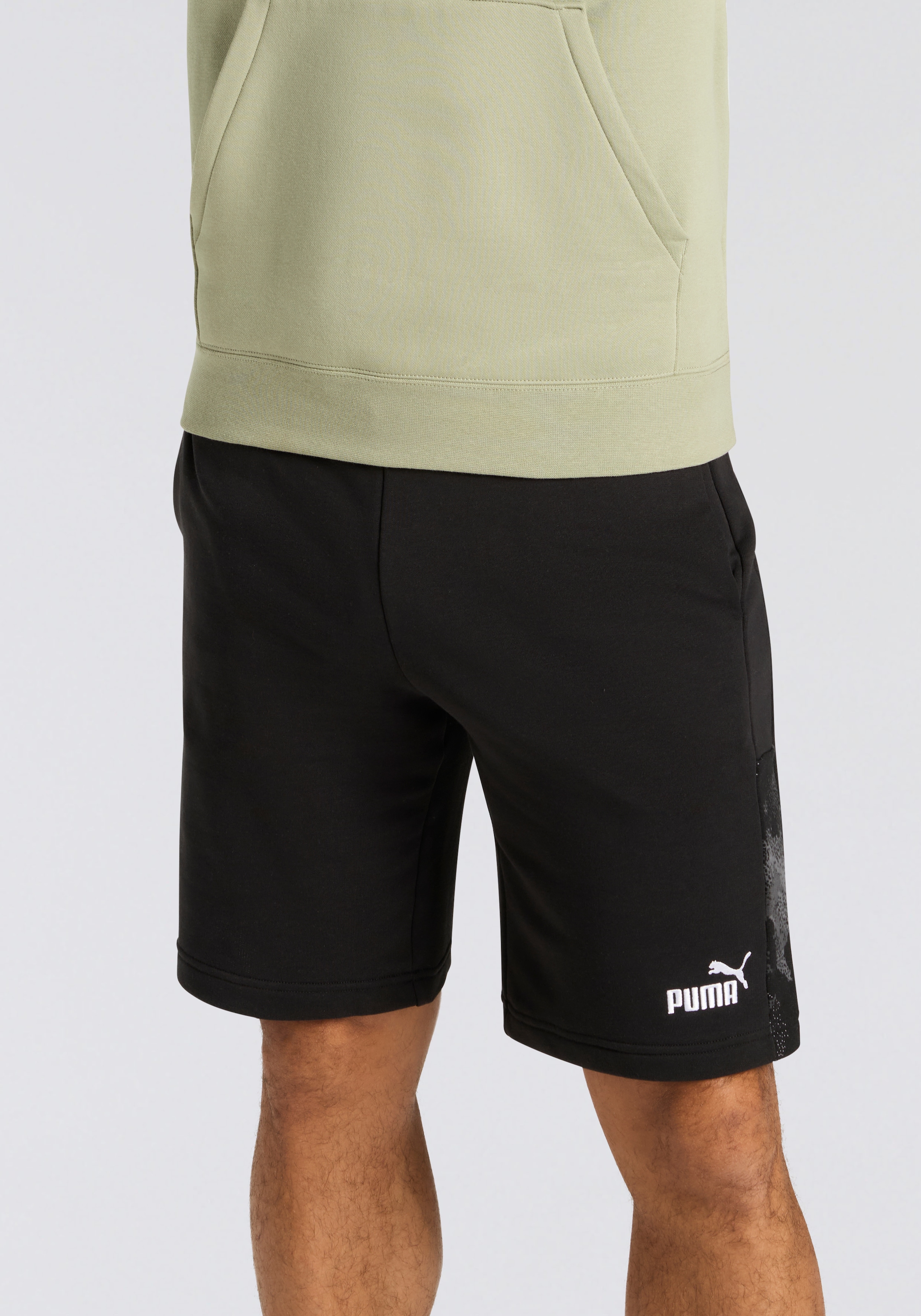 Image of PUMA Trainingsshorts "ESS CAMO SHORTS TR 10’’" mit Eingrifftaschen, sportlicher Stil, reguläre Passform