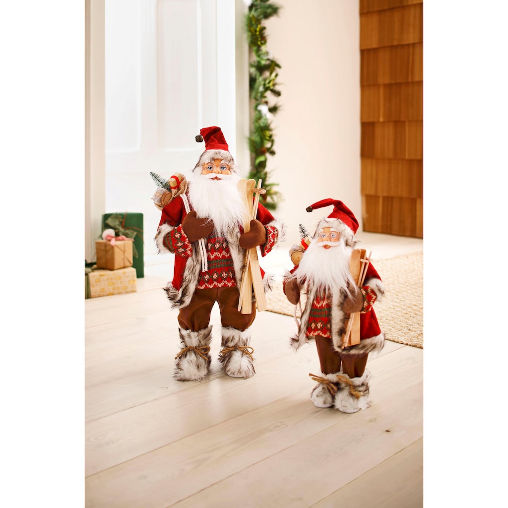 HOSSNER - HOMECOLLECTION Weihnachtsmann »Santa mit Skiern unter dem Arm und Geschenken«