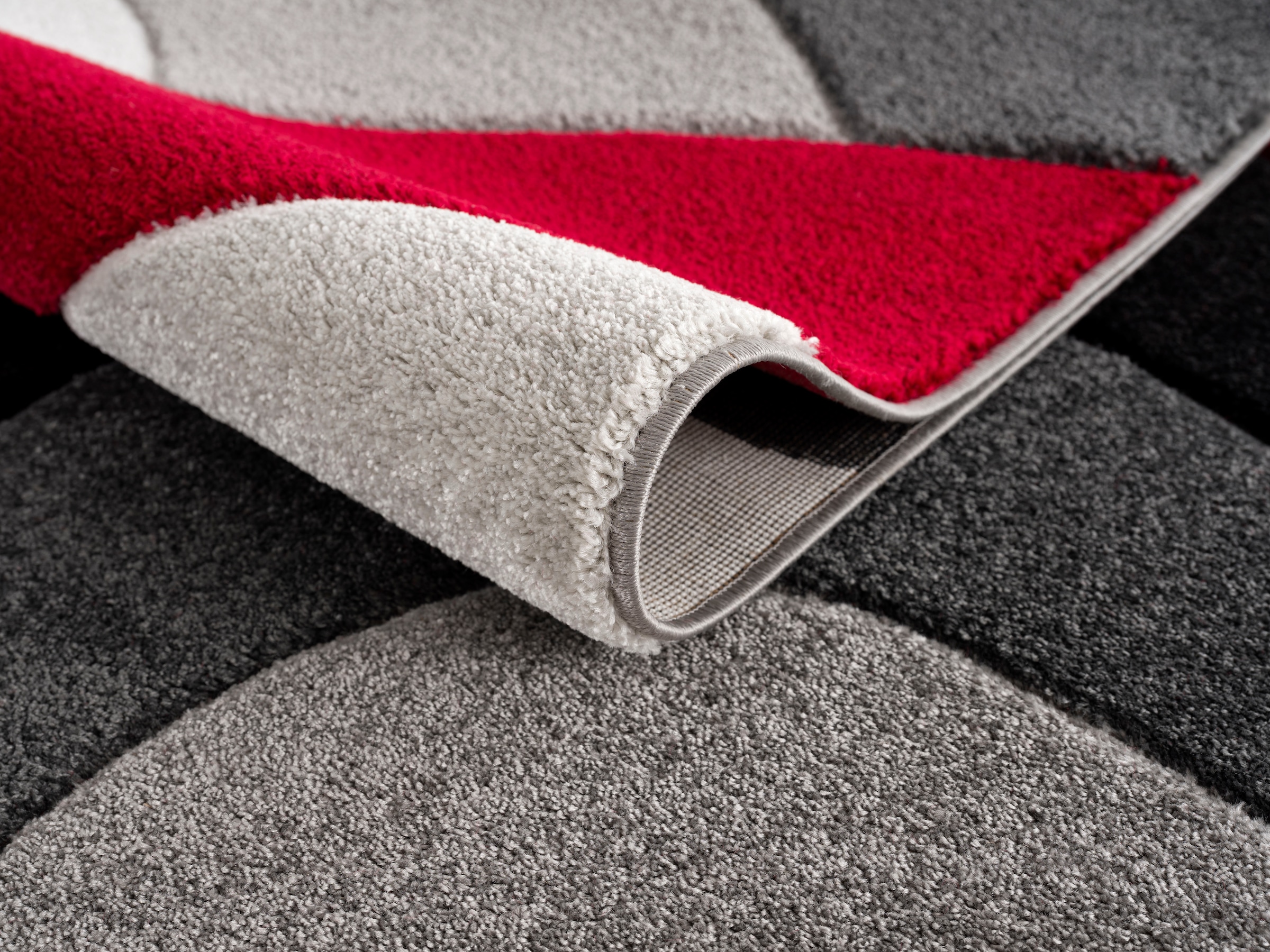 andas Teppich »Neele«, rechteckig, Wellen-Design, mit handgearbeitetem  Konturenschnitt, Wende-Teppich versandkostenfrei auf