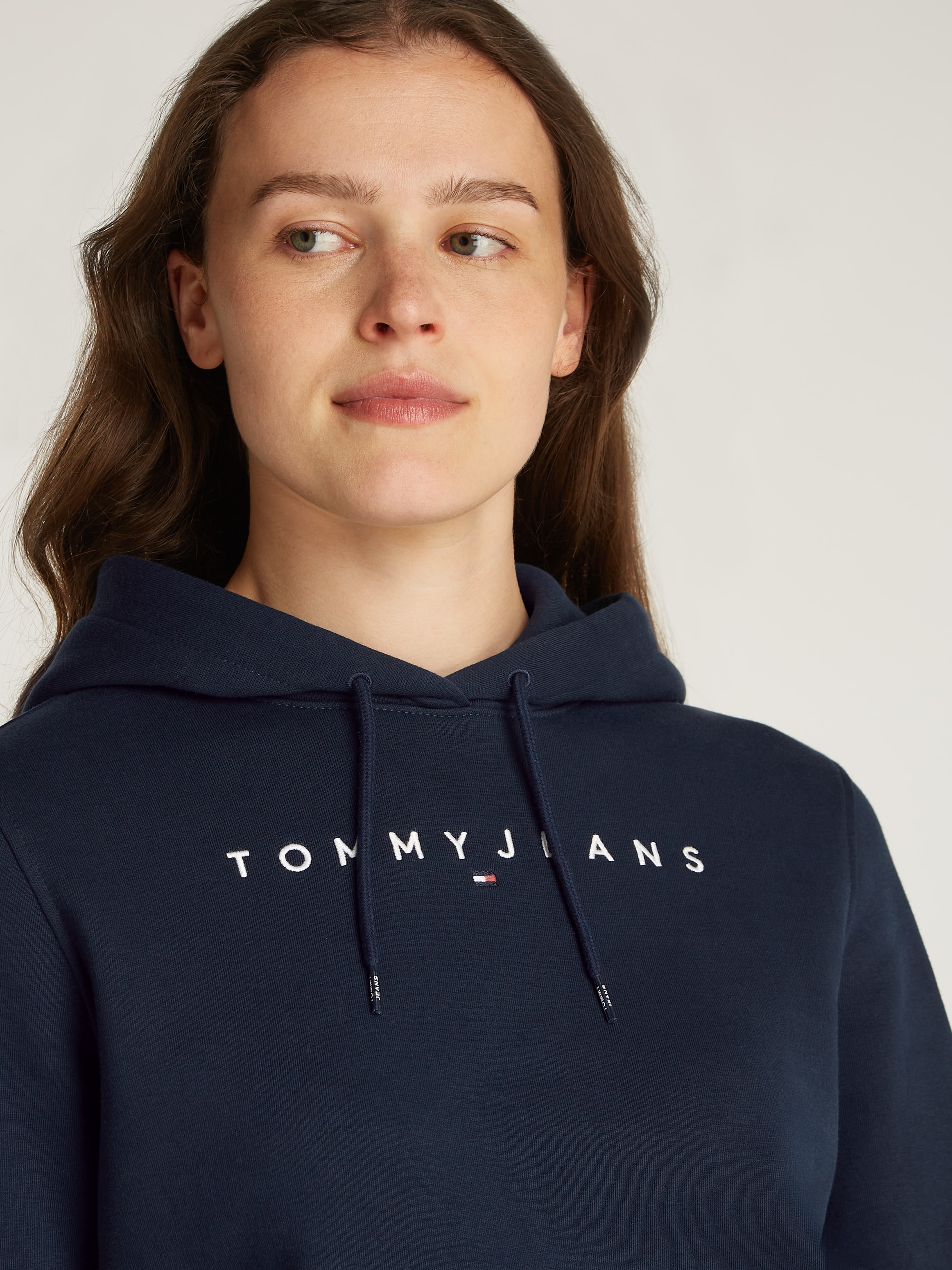 Tommy Jeans Kapuzensweatshirt »TJW REG LINEAR HOODIE«, mit Logoschriftzug