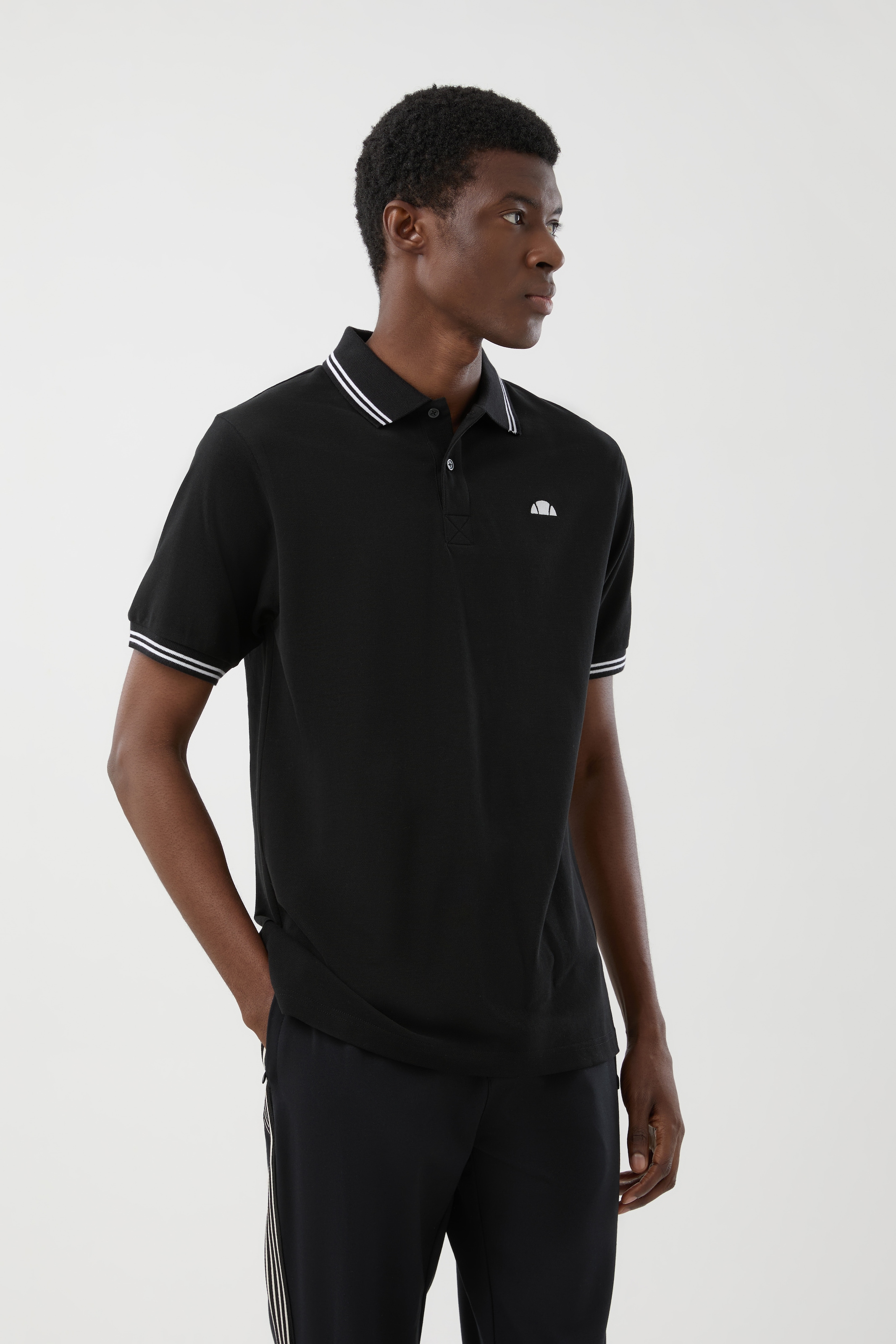 Image of Ellesse Poloshirt "Lioran Polo Shirt" für Erwachsene, sportlicher Stil, Kurzarm, Rundhalsausschnitt