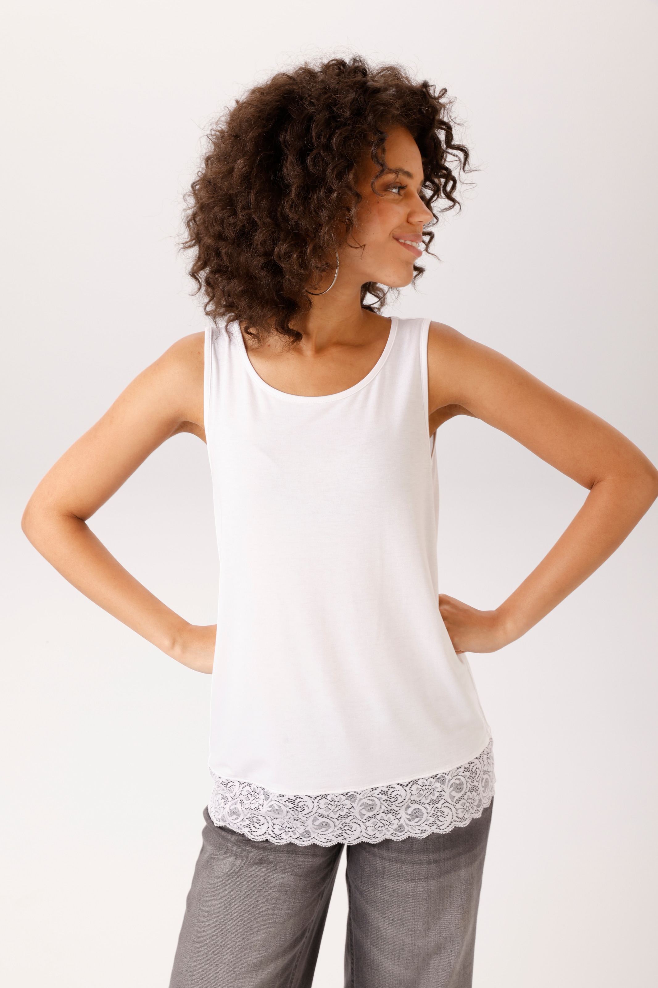 Image of Aniston CASUAL Tanktop mit gewellter, elastischer Spitzenborte am Saum - NEUE KOLLEKTION