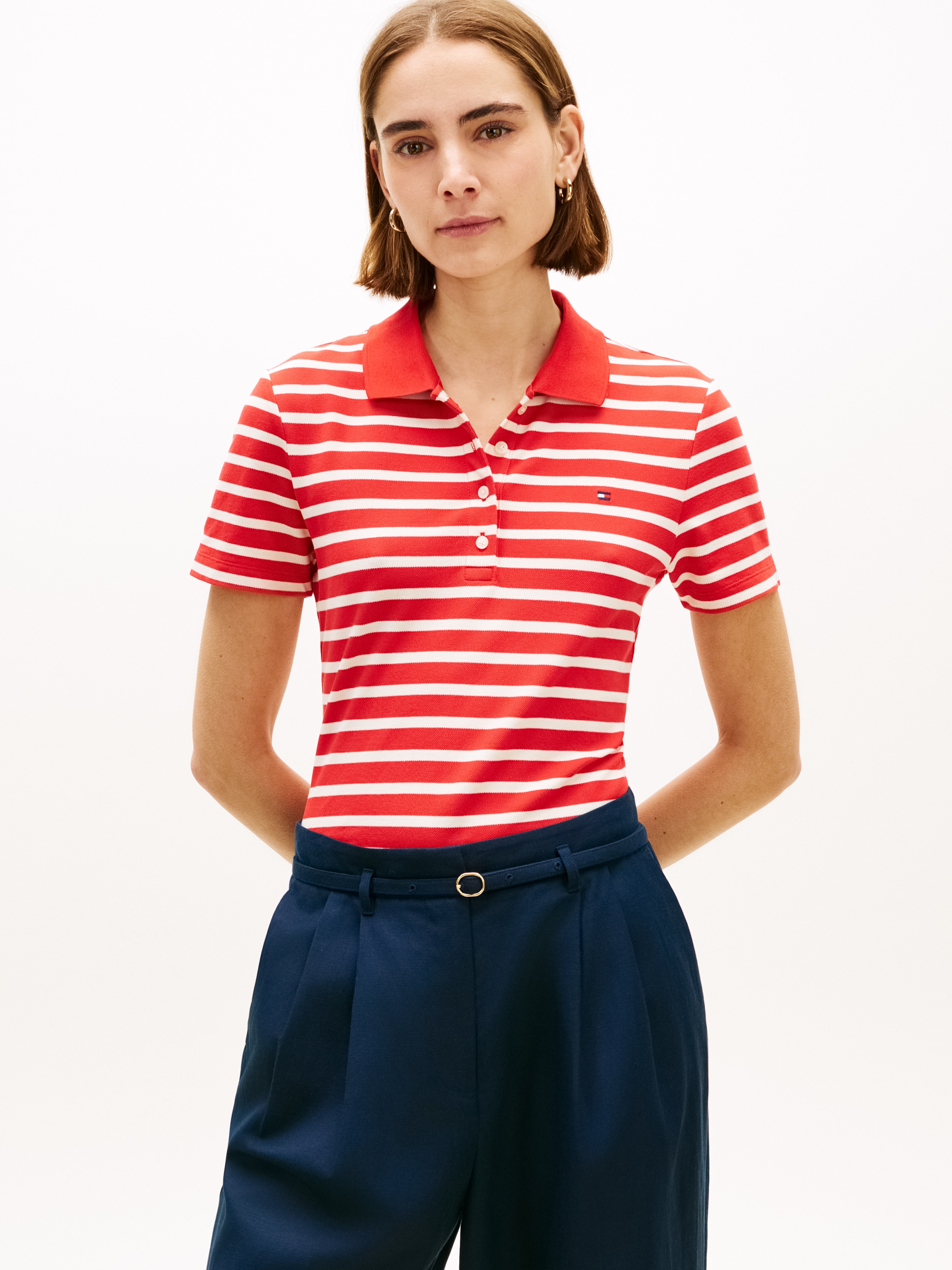 Image of Tommy Hilfiger Poloshirt "1985 Slim Fit Pique Premium" mit Logostickerei, Seitenschlitze