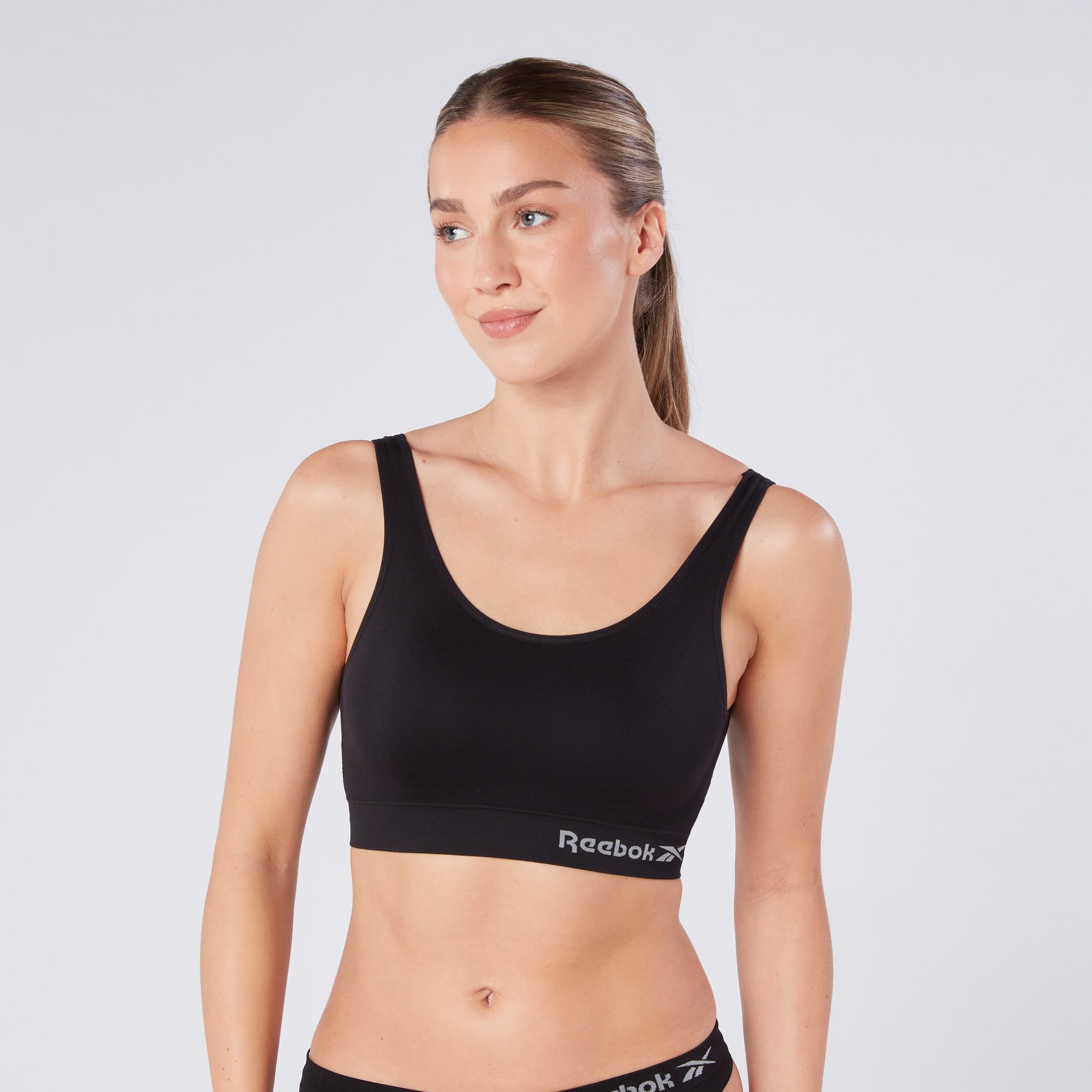 Reebok Bustier »KIRA« breite Träger, ohne Verschluss, bequem, basic, ohne Bügel, mit Logo
