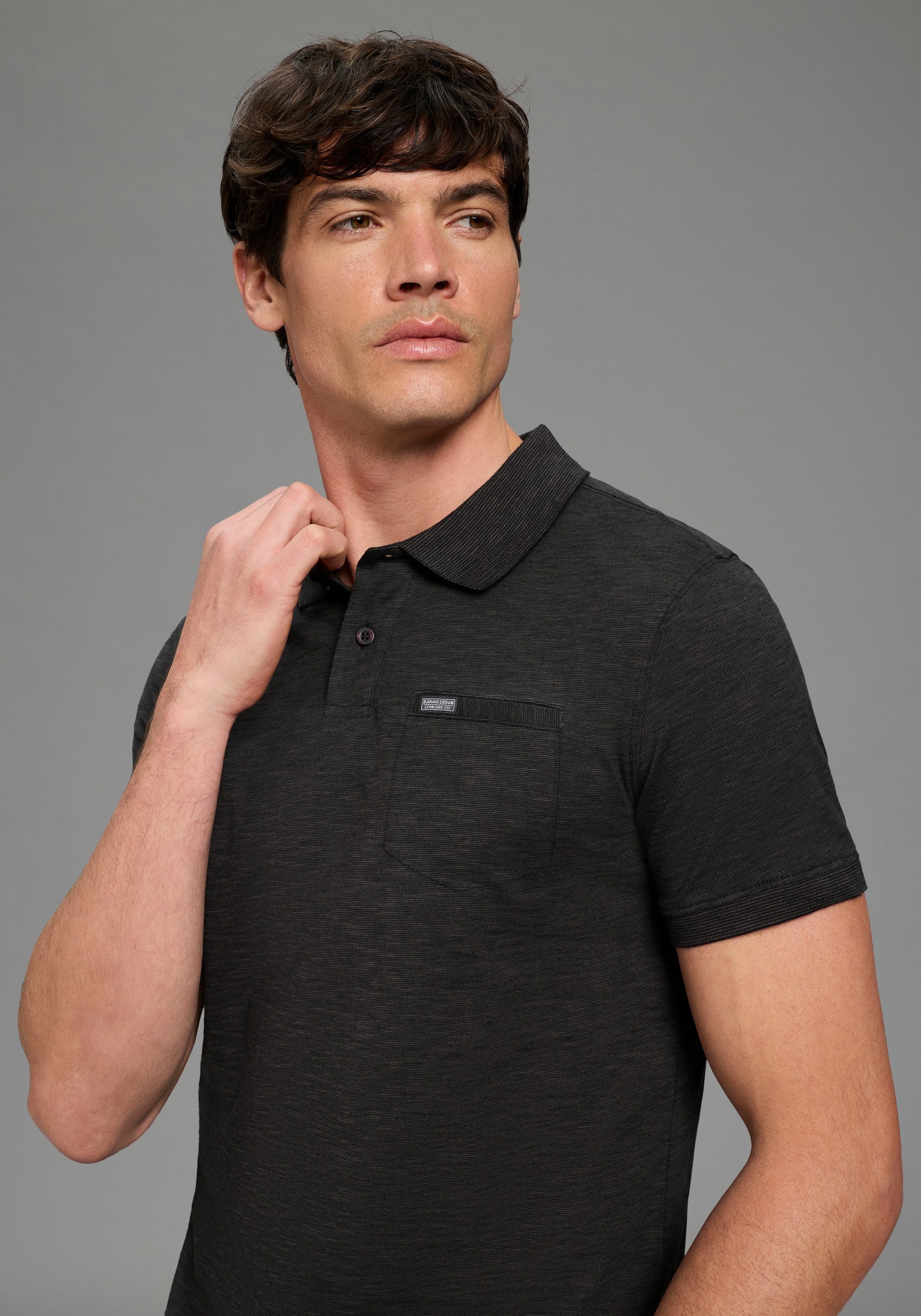 Bruno Banani Poloshirt »Spezial meliertes« schmale Passform, Kurzarm, mit Polokragen und Knöpfen