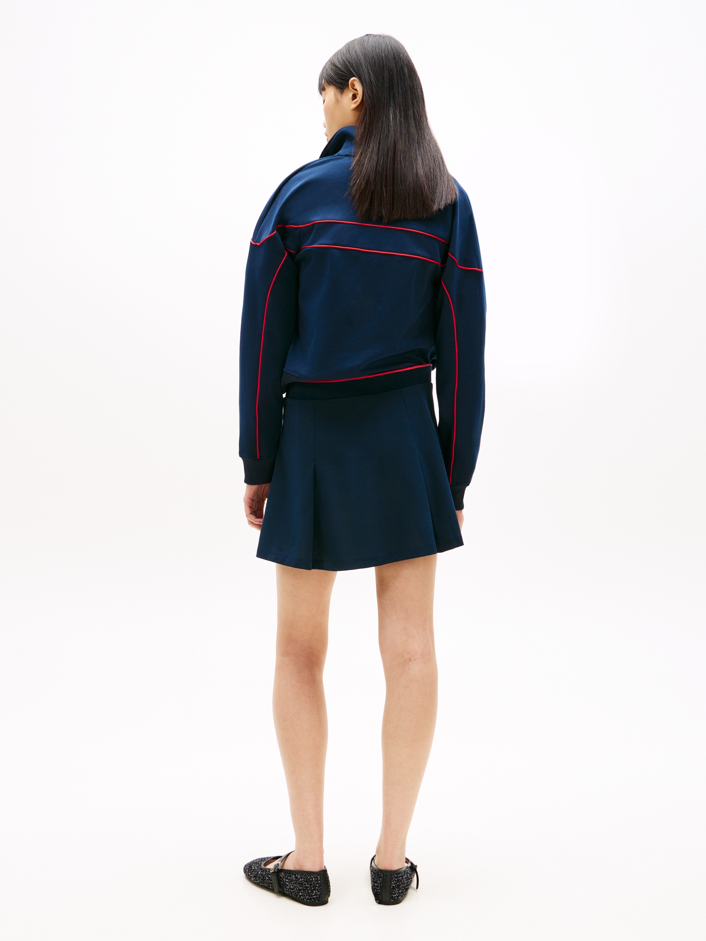 Tommy Jeans Jupe en ligne A »TJW PIQUE F&F MINI SKIRT« avec les plis classiques