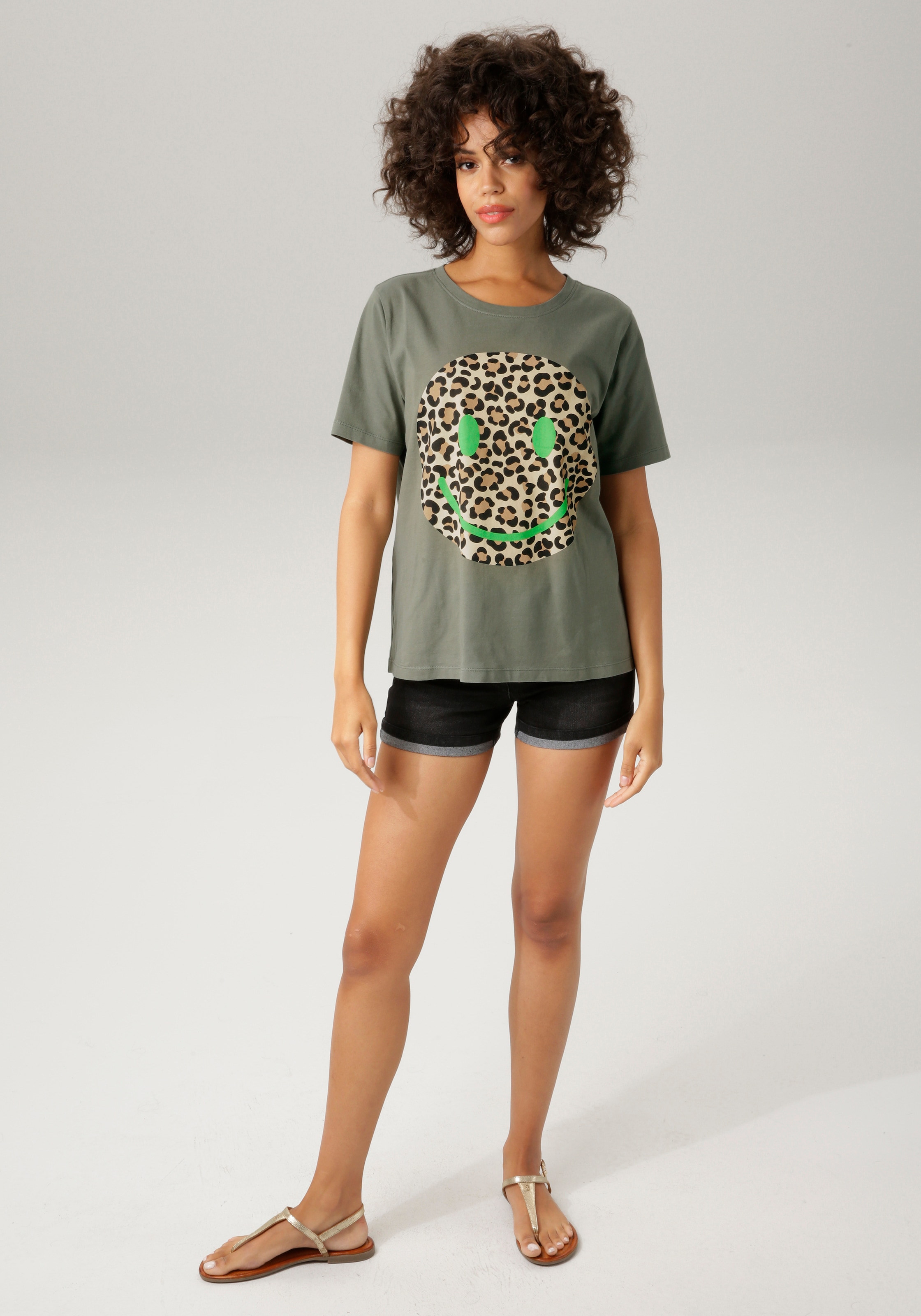 Aniston CASUAL T-Shirt, mit Smiley-Frontprint im Animal-Look