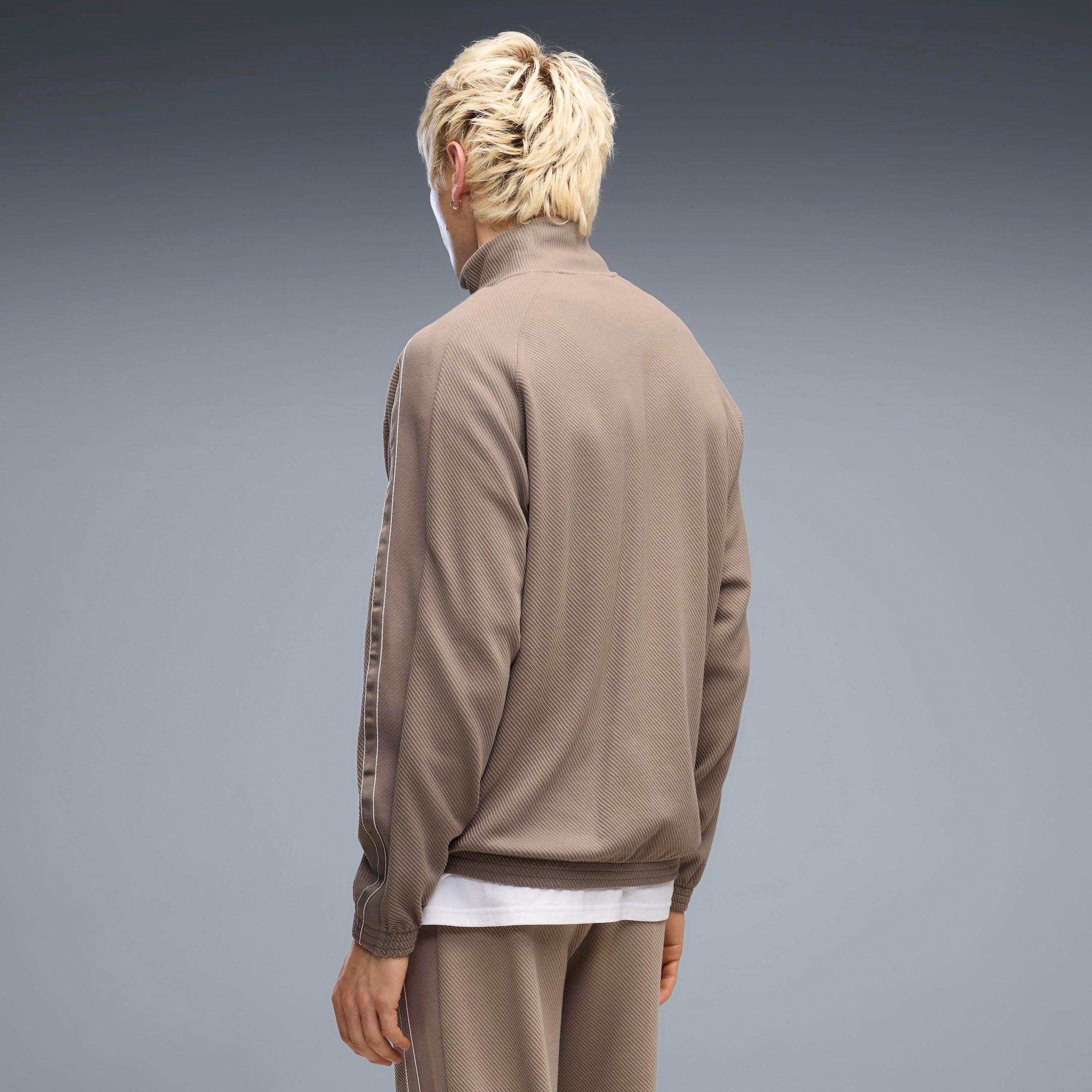 PUMA Trainingsjacke »CLASS RELAXED MATERIAL TRACK JACKET« ohne Kapuze mit Stehkragen, unifarbenes Design, Relaxed Fit