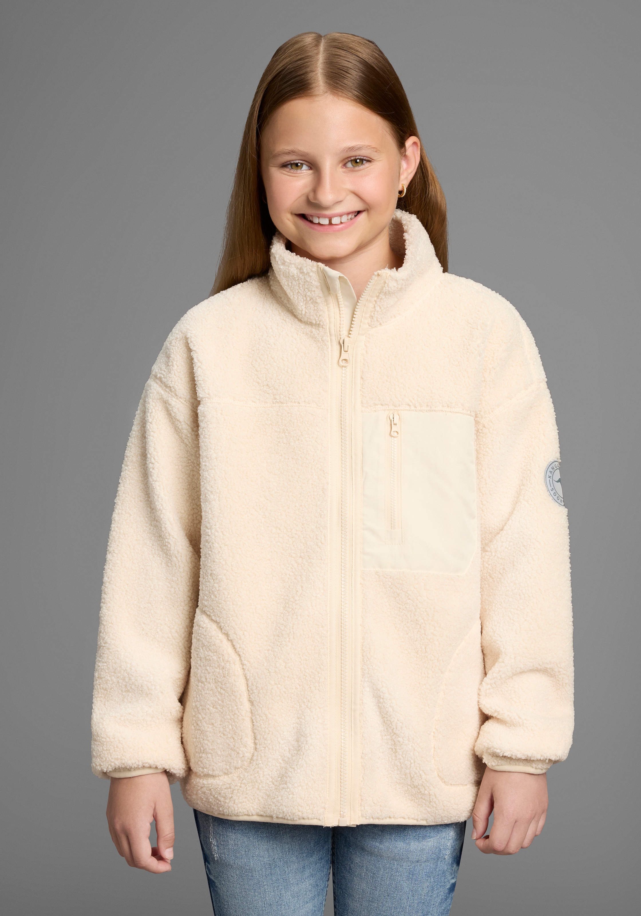Image of KangaROOS Sweatjacke "Fleecejacke, Kuschel-Jacke mit reflektierendem Badge" Weicher Teddyplüsch