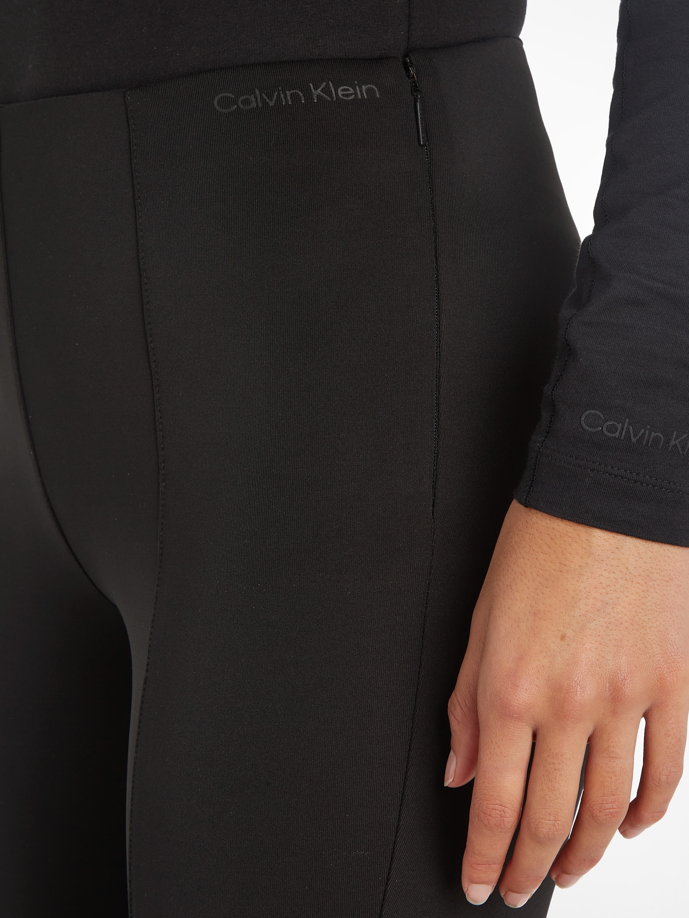 Calvin Klein Leggings »TECHNICAL KNIT LEGGING«, mit Reissverschluss am Beinabschluss