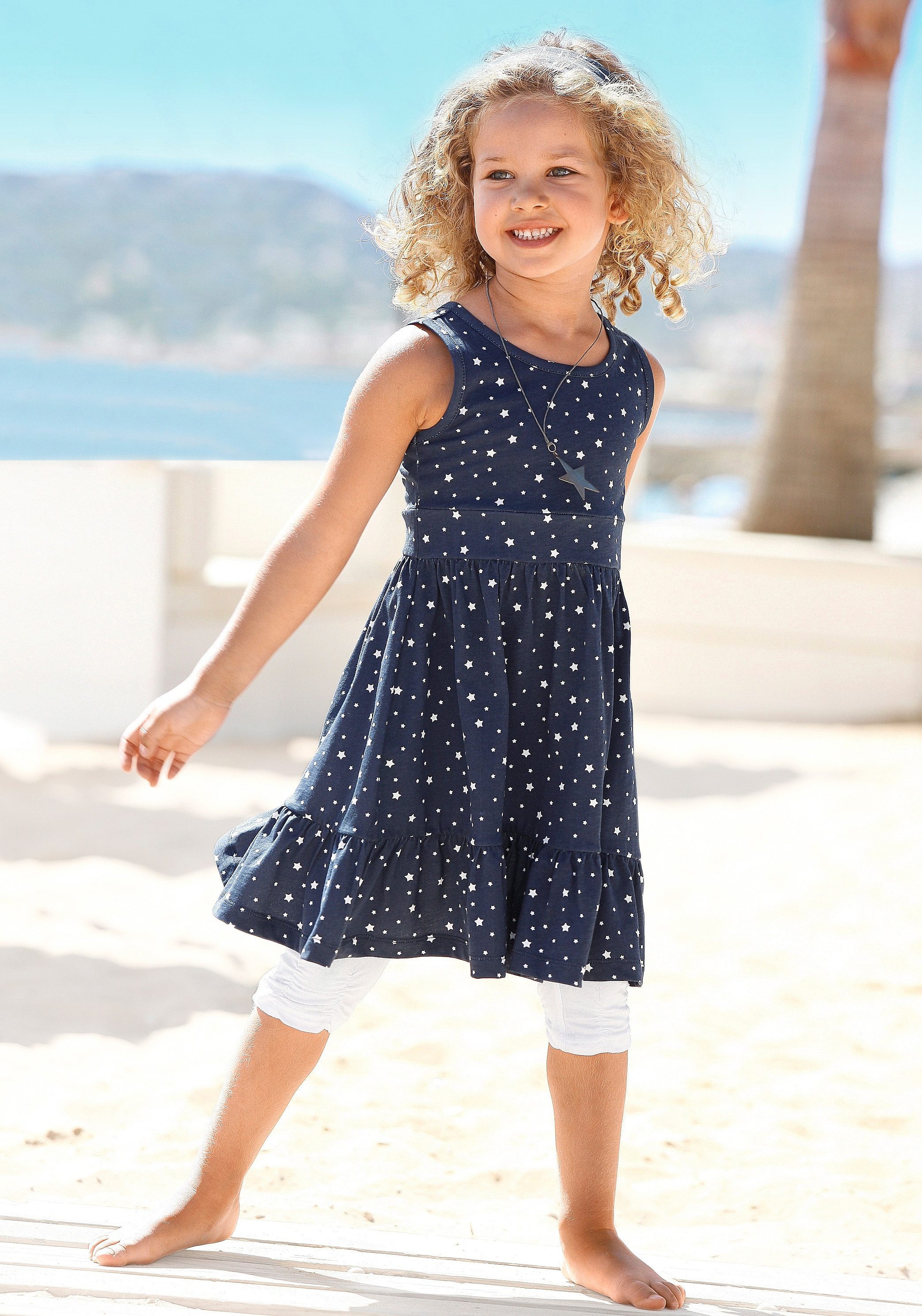 KIDSWORLD Jerseykleid »2tlg. Shirtkleid + Haarband im niedlichen Sternen-Allover«, (Set, 2 tlg.), mit passendem Haarband