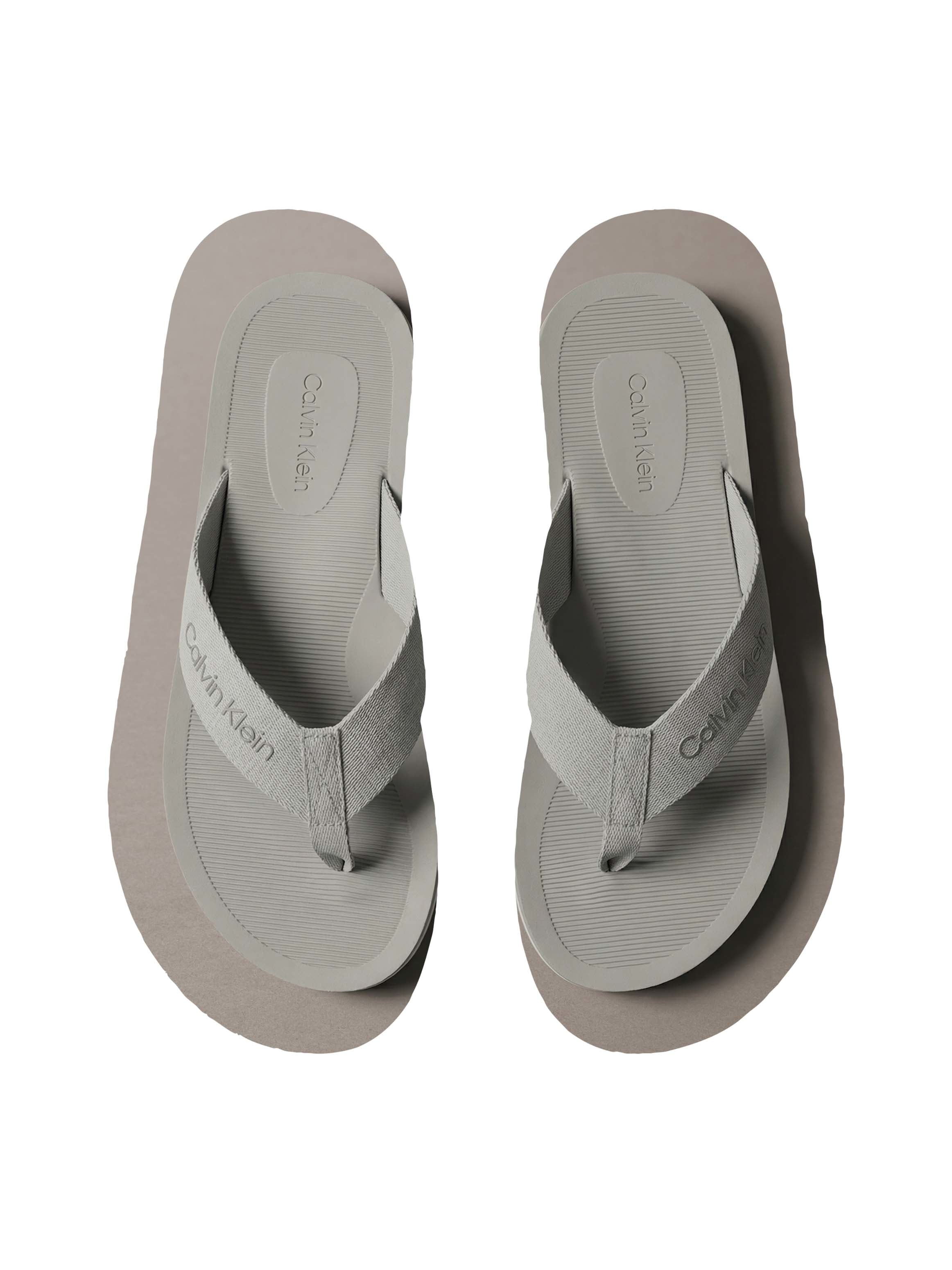 Calvin Klein Séparateur d'orteils »CITY THONG SLIDE«  chaussure de plage, pool slides, chaussure de bain, plate avec logo
