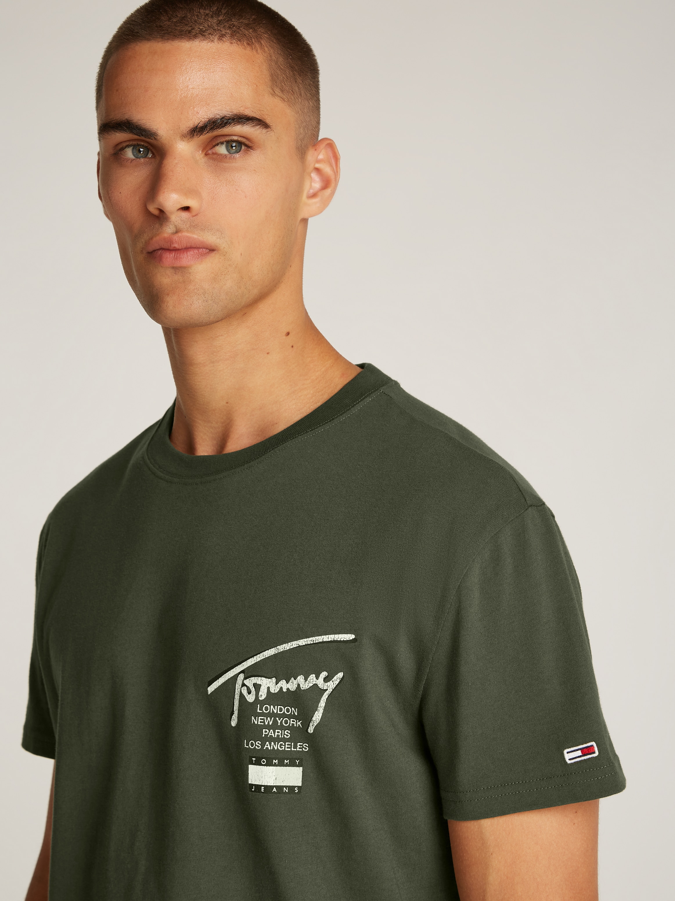 Tommy Jeans T-Shirt »TJM REG TOMMY SIGN CITY TEE EXT«, mit grossem Logo am Rücken