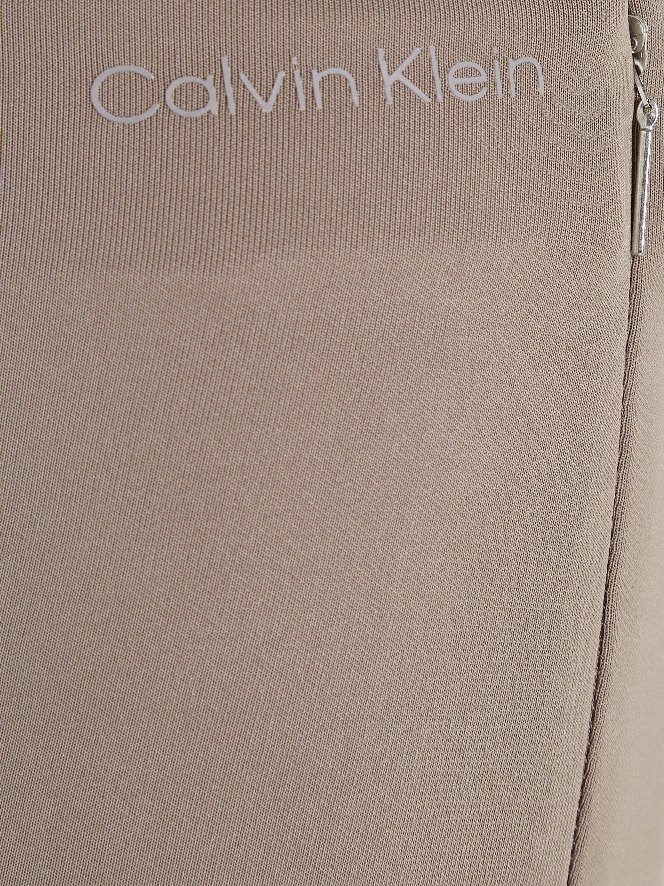 Calvin Klein Leggings »TECHNICAL KNIT LEGGING«, mit Reissverschluss am Beinabschluss