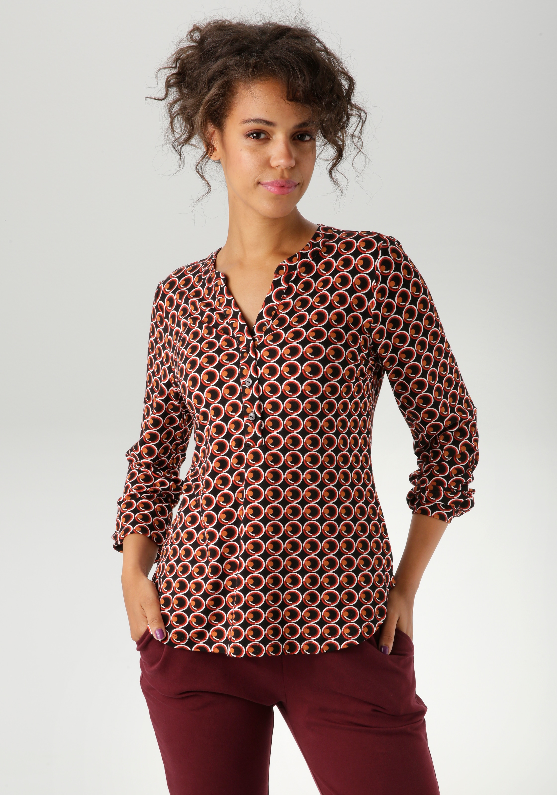 Image of Aniston CASUAL Schlupfbluse mit ausdrucksvollem Retro-Druck
